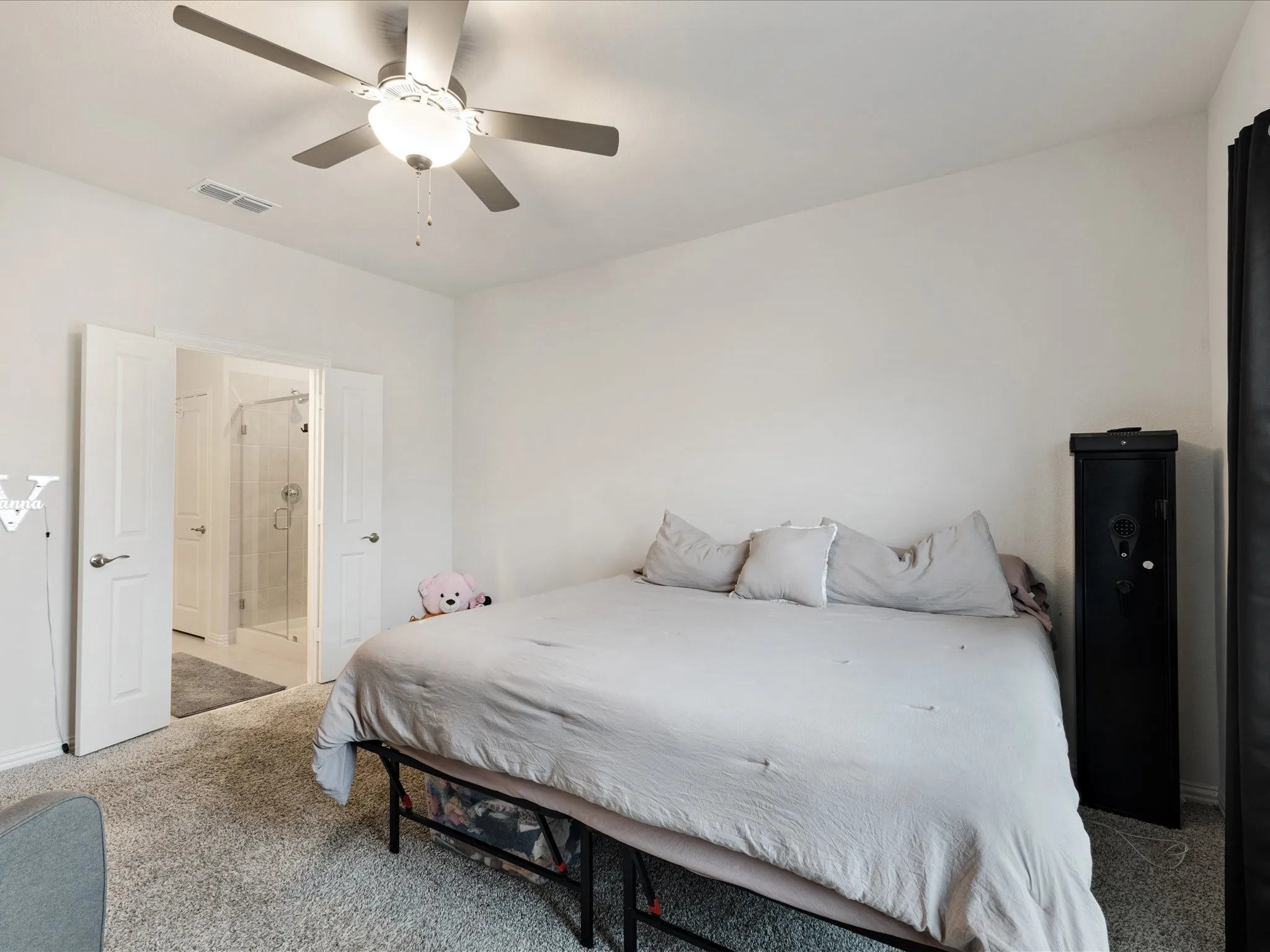 White painted walls with light gray carpet
