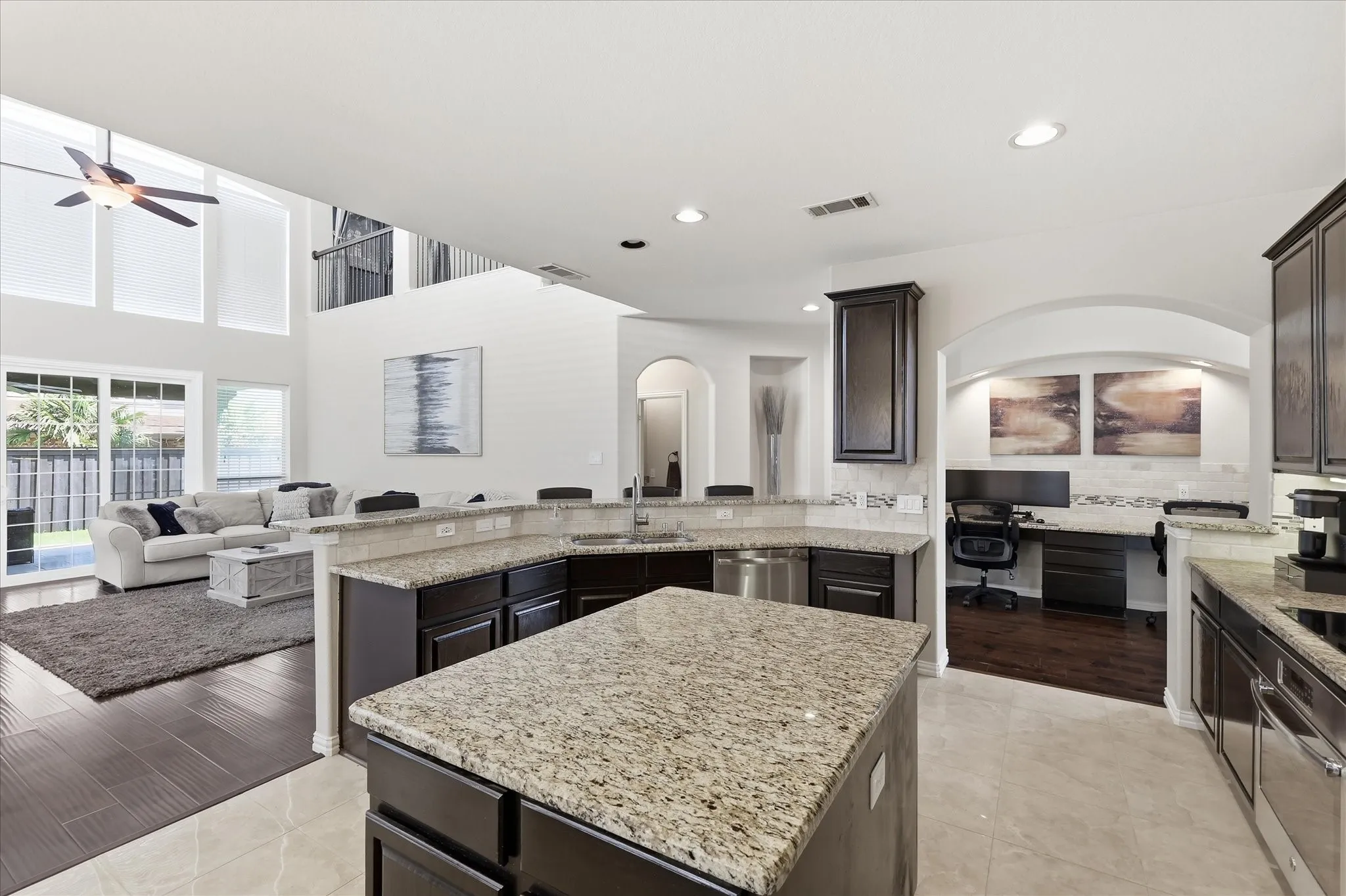 Granite, stainless steel appliances and electric cooktop