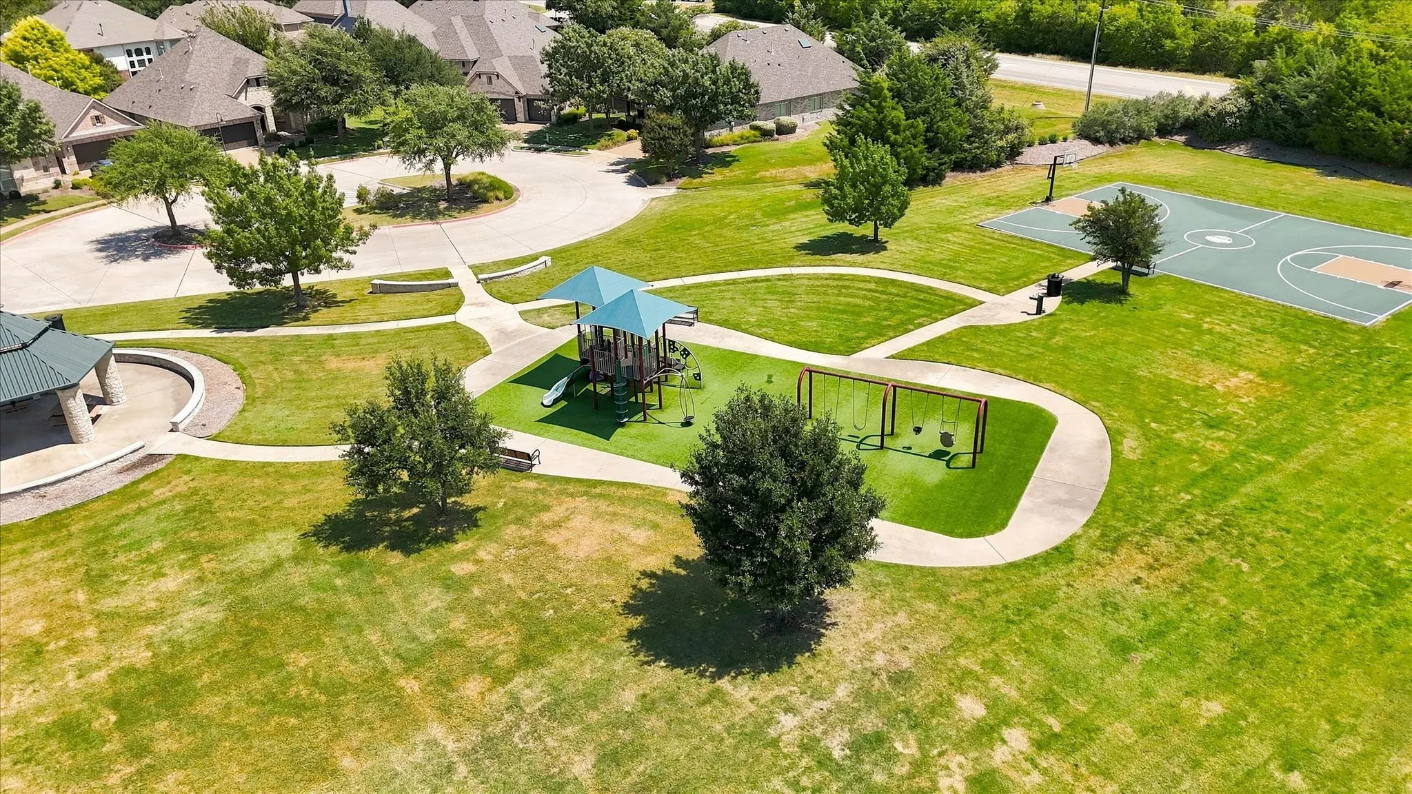The neighborhood offers plenty of ways to enjoy the outdoors, with a playground, basketball court, and open green spaces providing room to play, relax, and enjoy time outside.