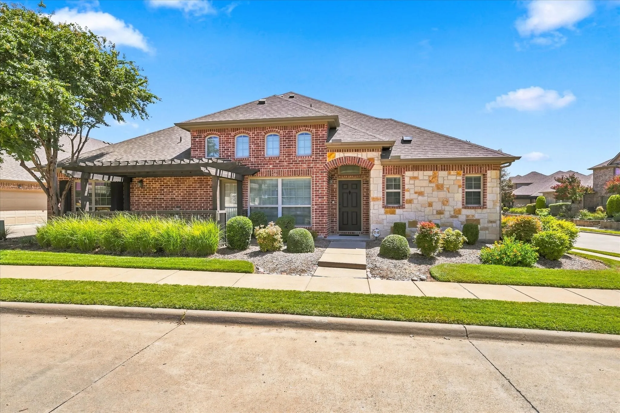 A private patio accessible directly from the living room creates an inviting extension of the home, offering the perfect spot to enjoy your morning coffee, relax outdoors, or spend time with family and friends.