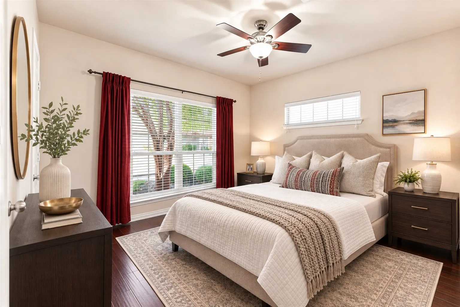 The spacious secondary bedroom is shown virtually staged to illustrate its size and versatility, offering a clear sense of how the space can function for guests, family, or a home office. Windows bring in plenty of natural light, creating a warm and welcoming space.