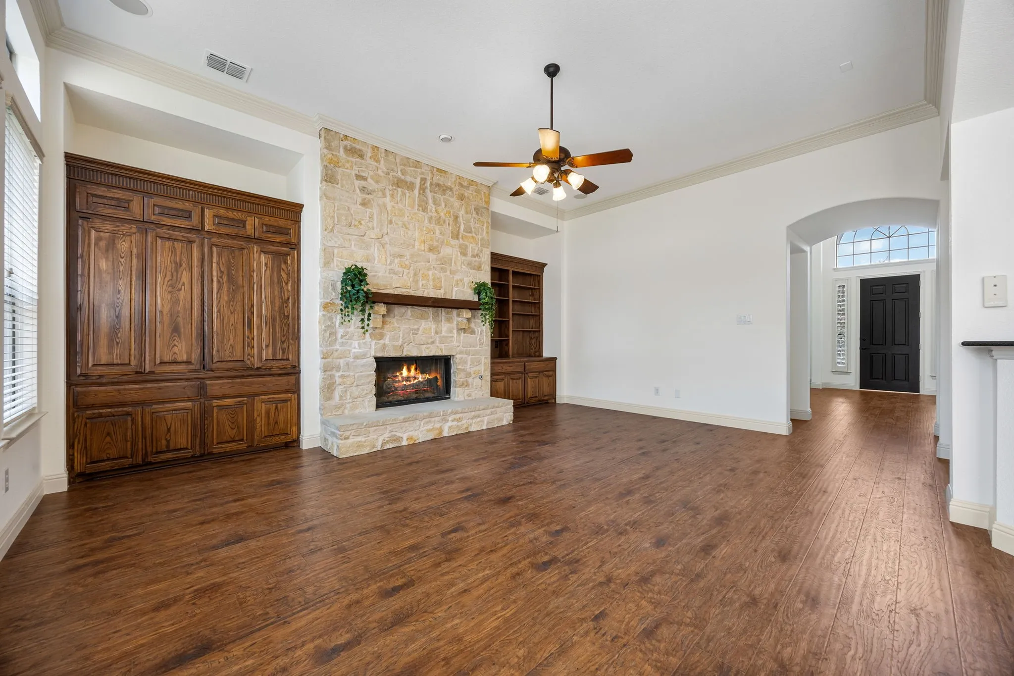 Family Room features fireplace and built-in cabinets