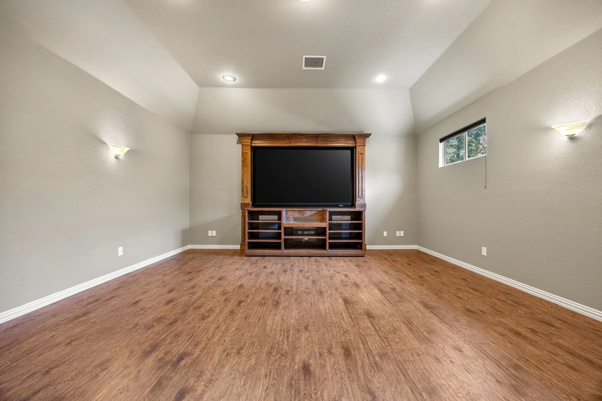 Media Room features cabinet and large screen