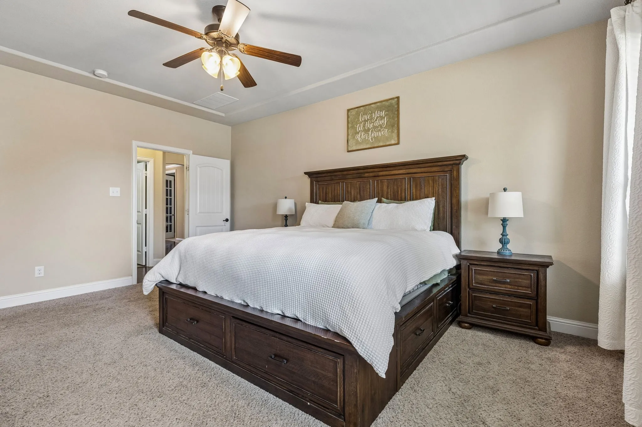 Another view of the primary bedroom