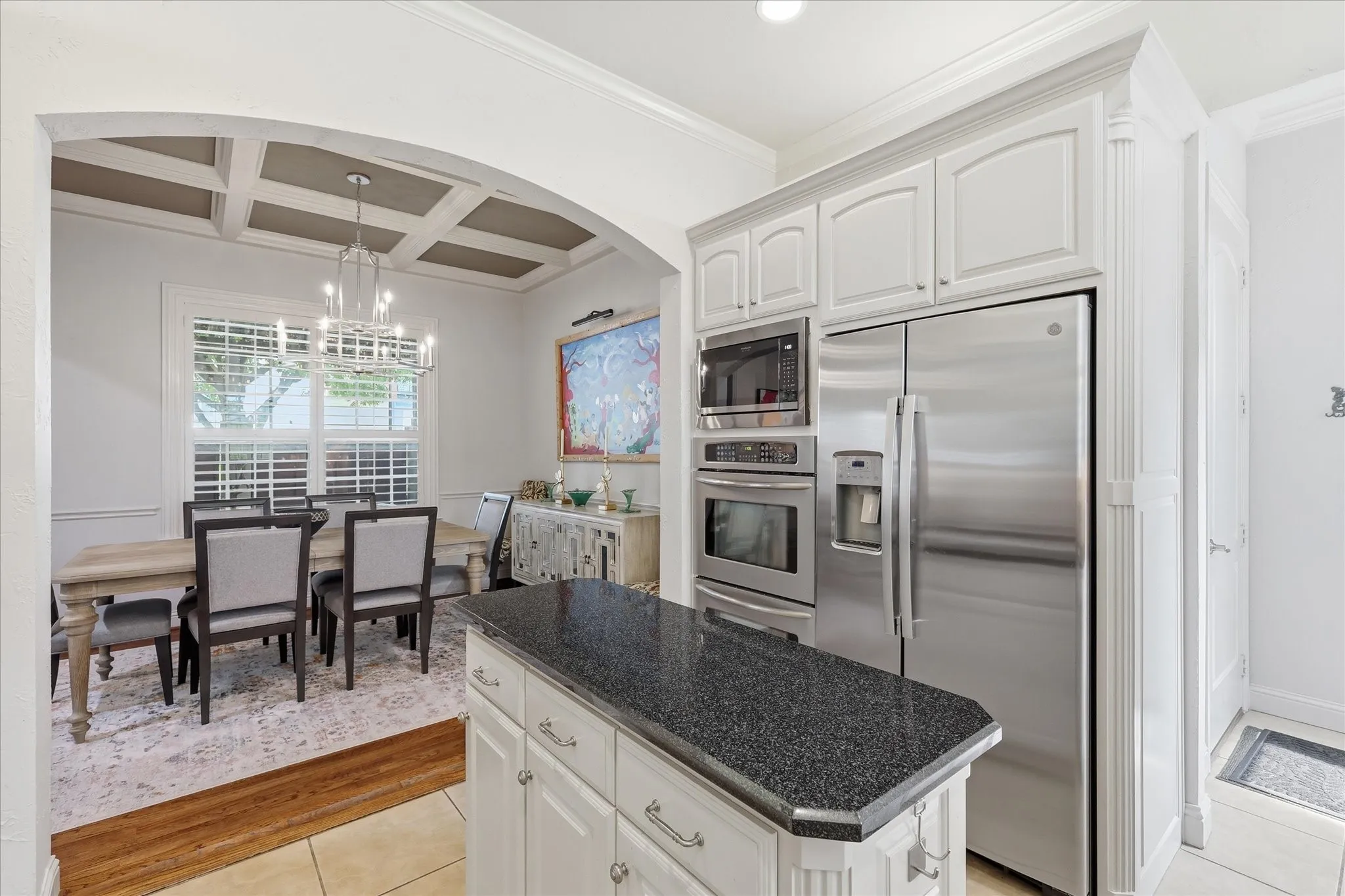 A view from the kitchen to the dining room