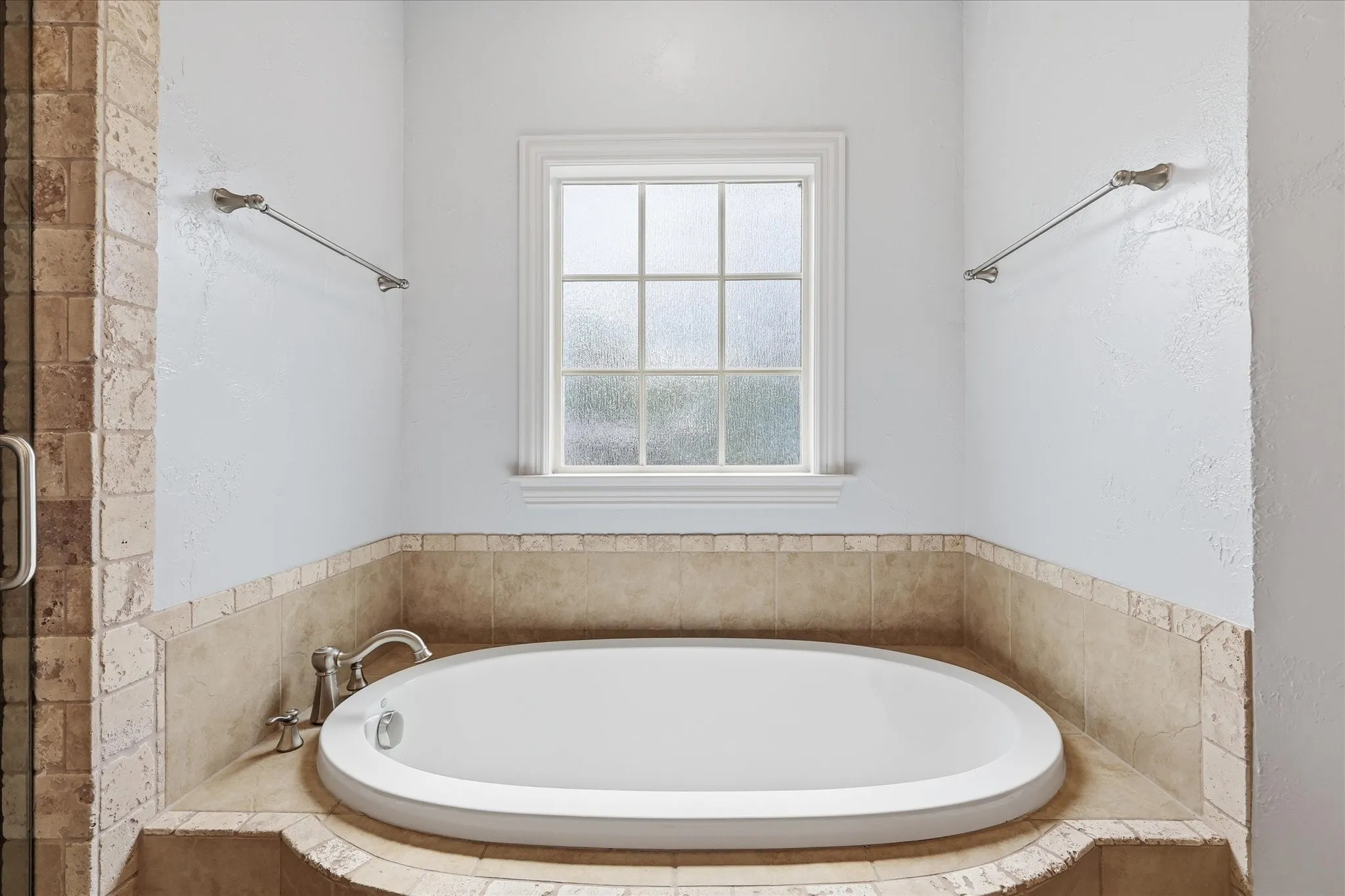 The soaking tub in the primary bath
