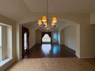 Dining Space View into Second Living Space and Back-yard Views