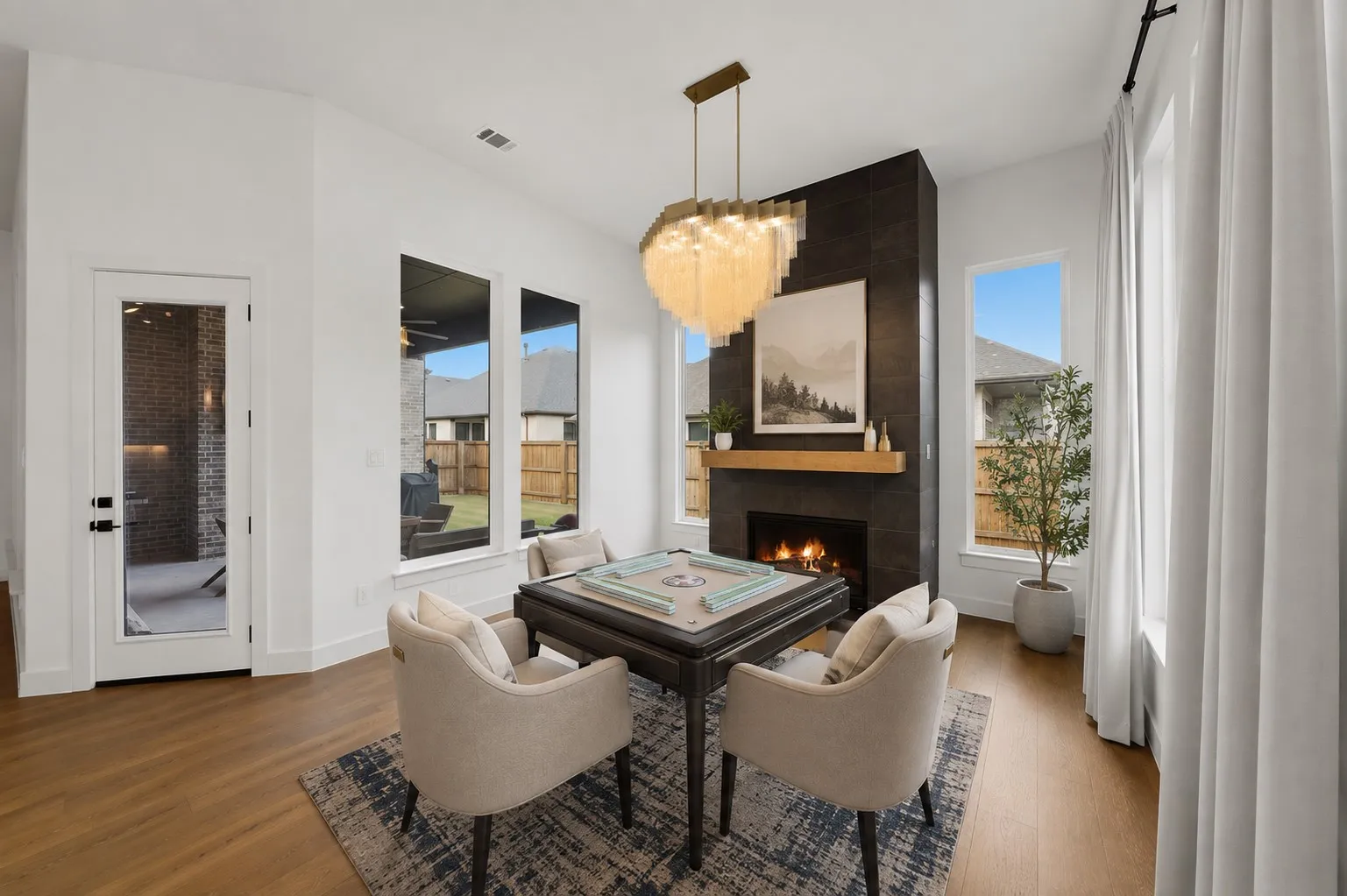 hearth room space with fireplace virtually staged as mahjong space