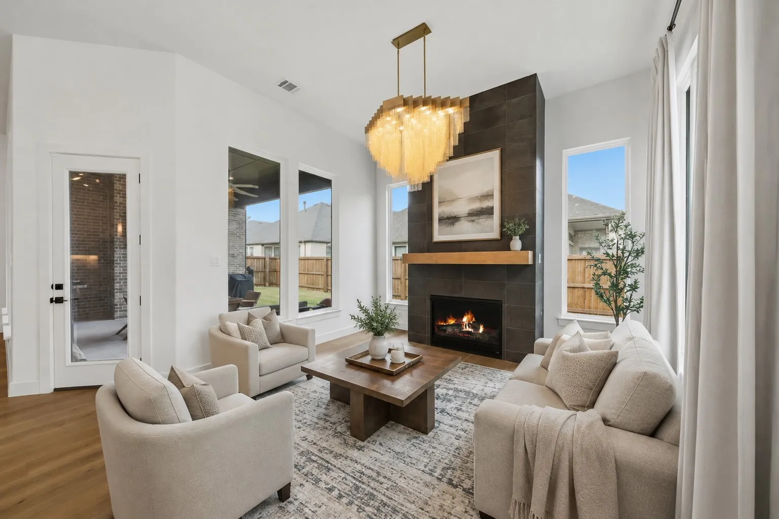 Hearth room/second sitting area with 3rd fireplace.