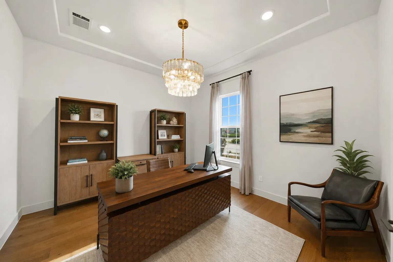 Tray ceiling with recessed lighting, wood-finish flooring, and a crystal chandelier