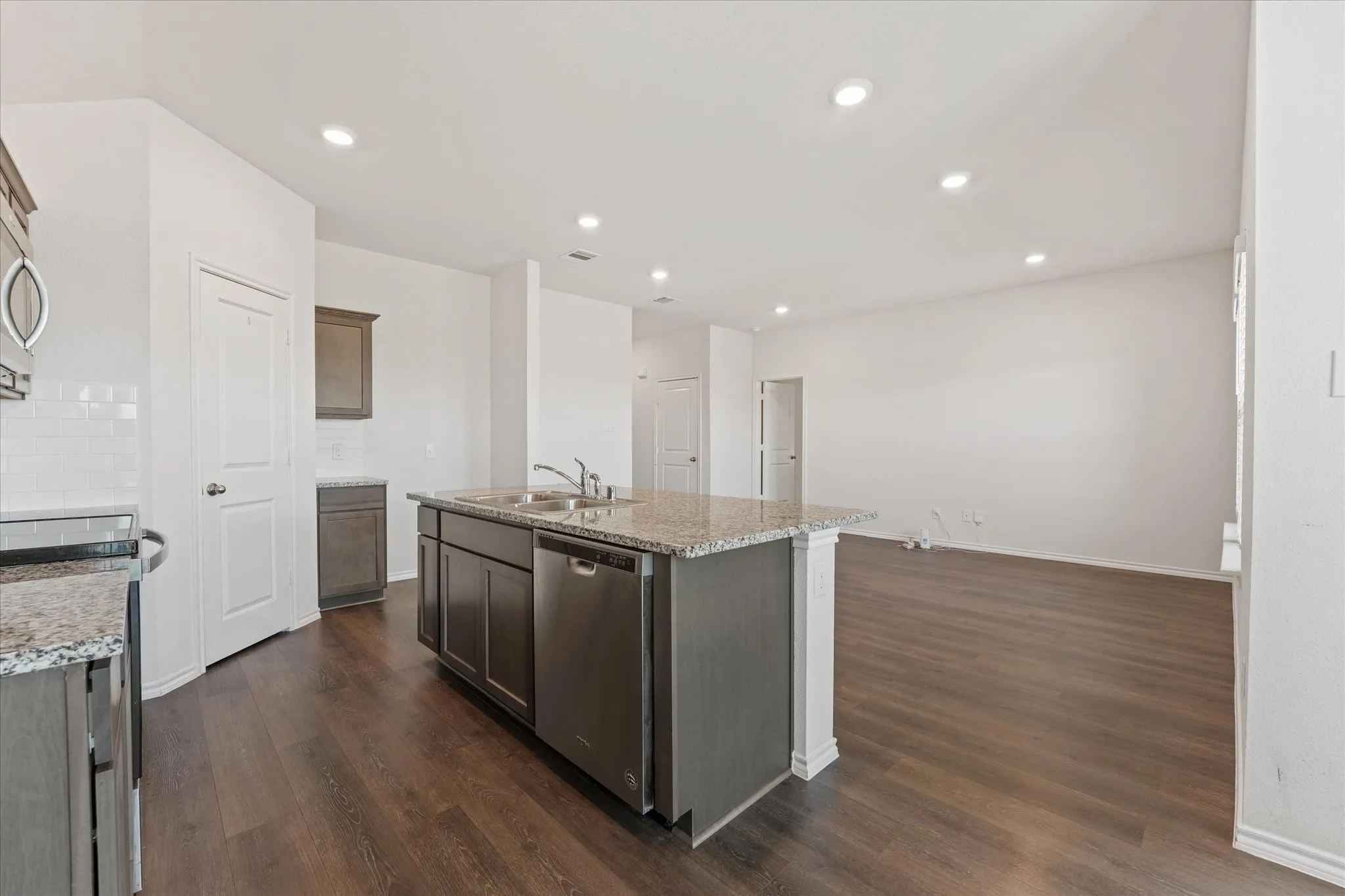 Looking into the open concept living room and kitchen.