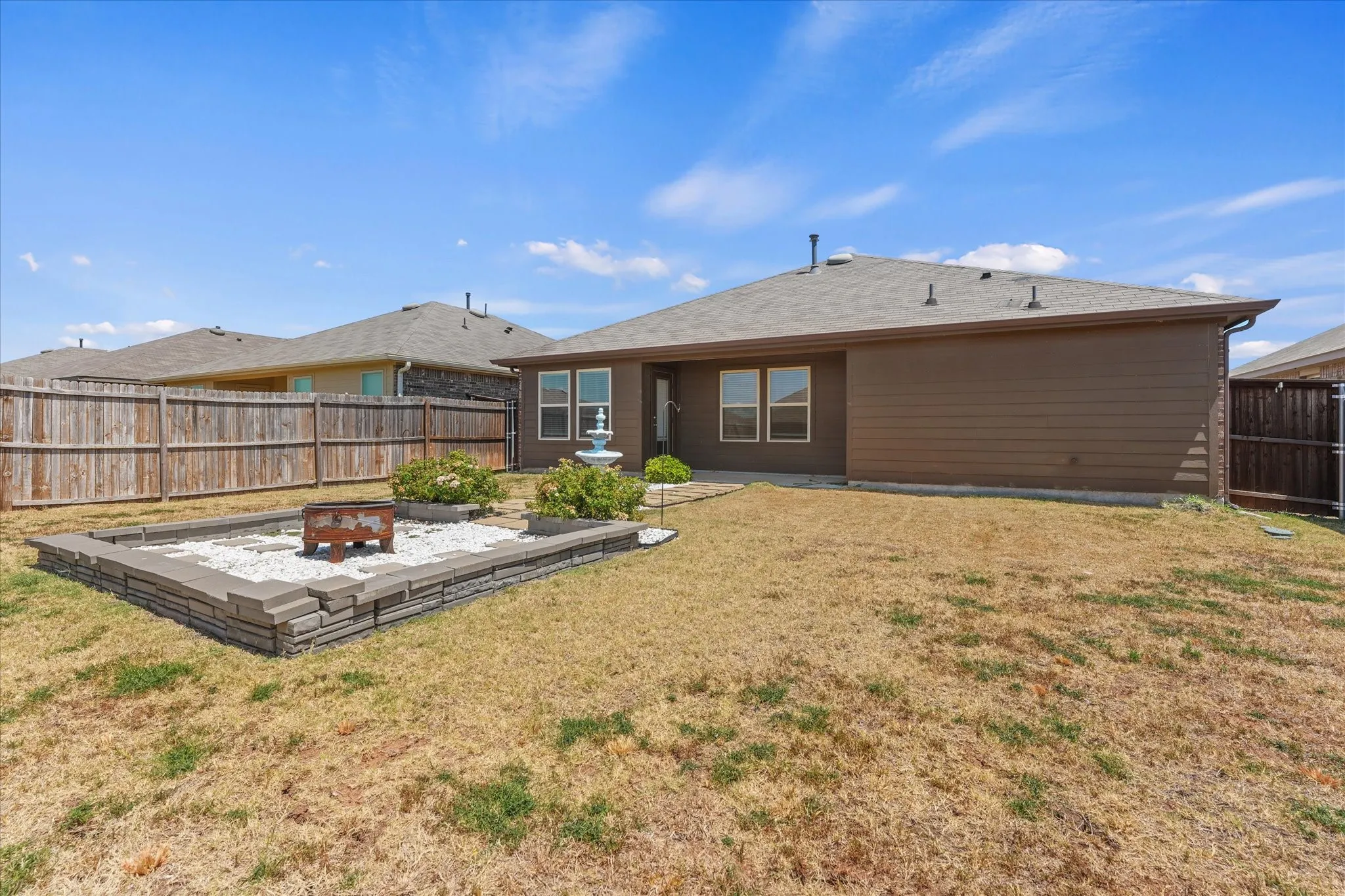 The private backyard has lots of room to run and play