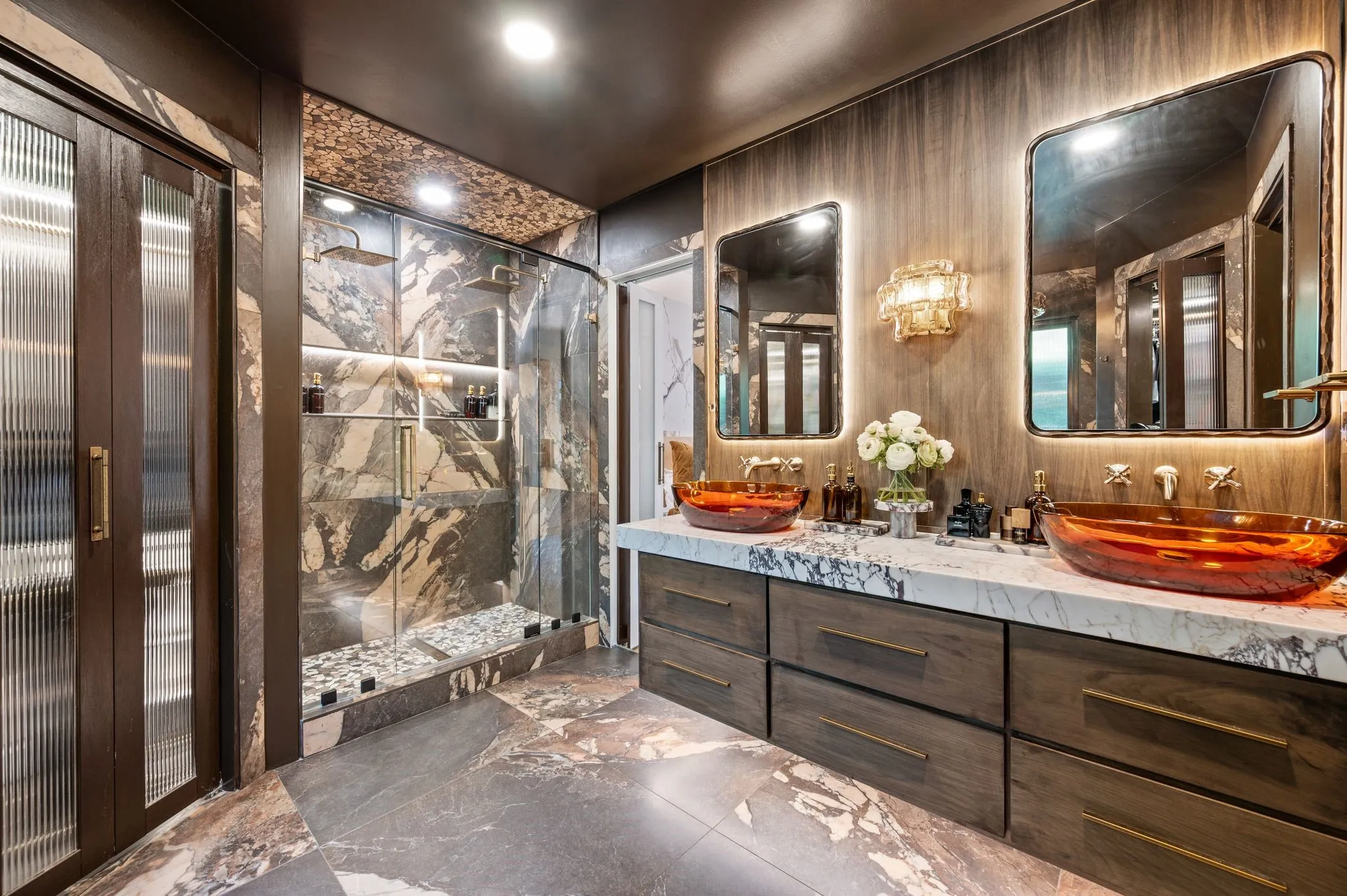 Primary Bathroom with custom resin sinks and custom resin bathtub.