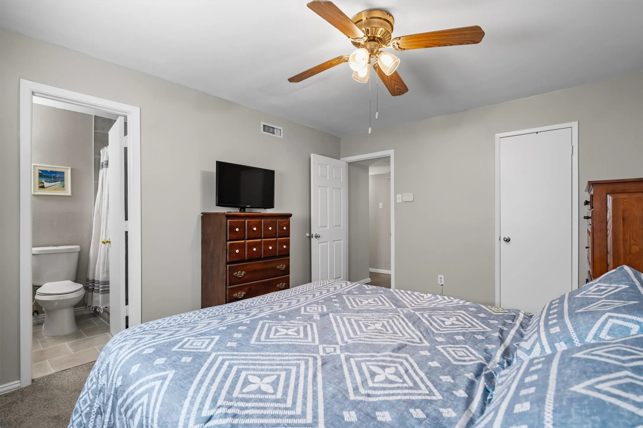 Primary bedroom has a private ensuite bathroom.