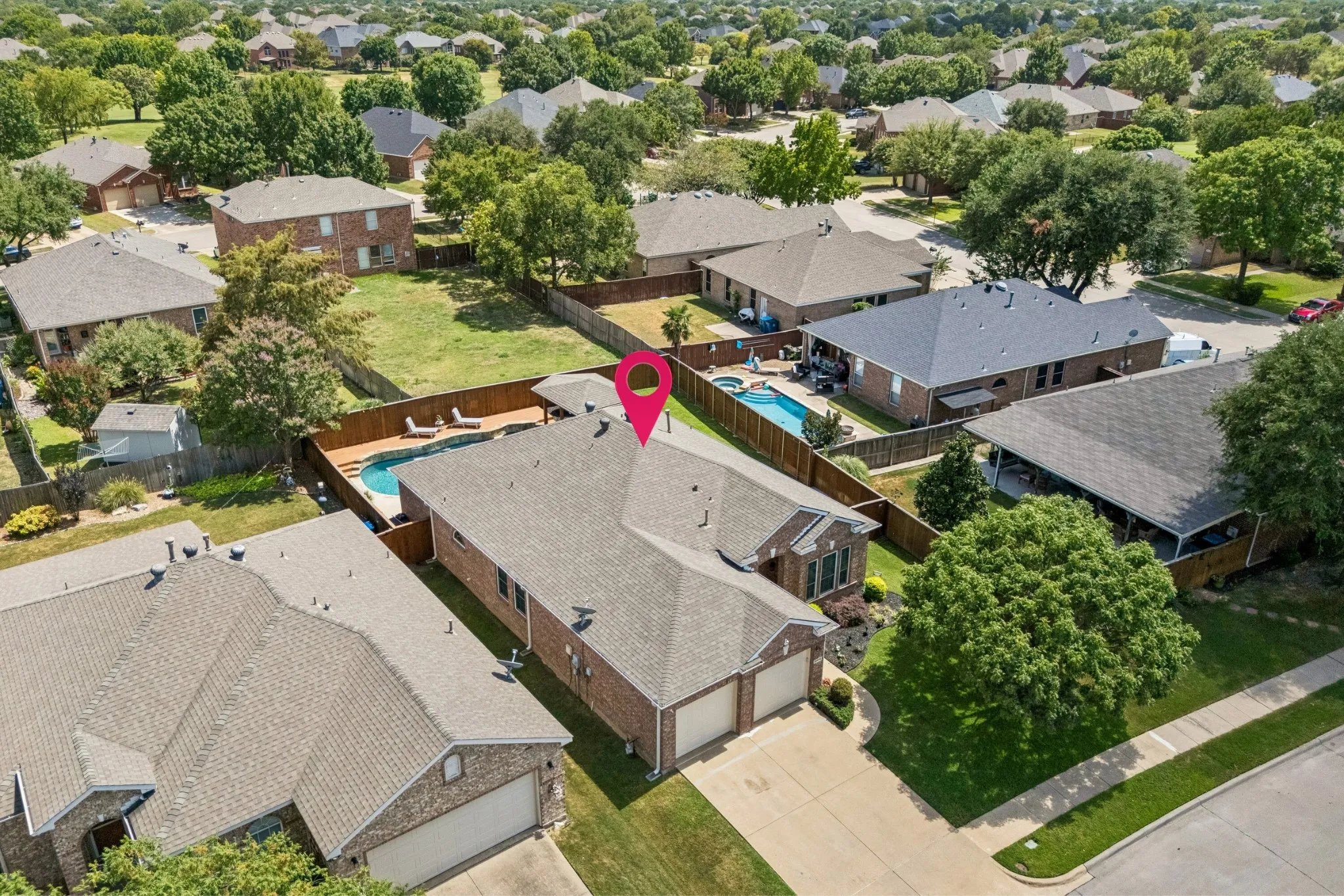 An Oversized Lot with a Private Backyard Retreat - From above, the property’s generous lot becomes clear, with a pool, spa, covered patio, deck, and remaining green space creating multiple ways to enjoy the outdoors.