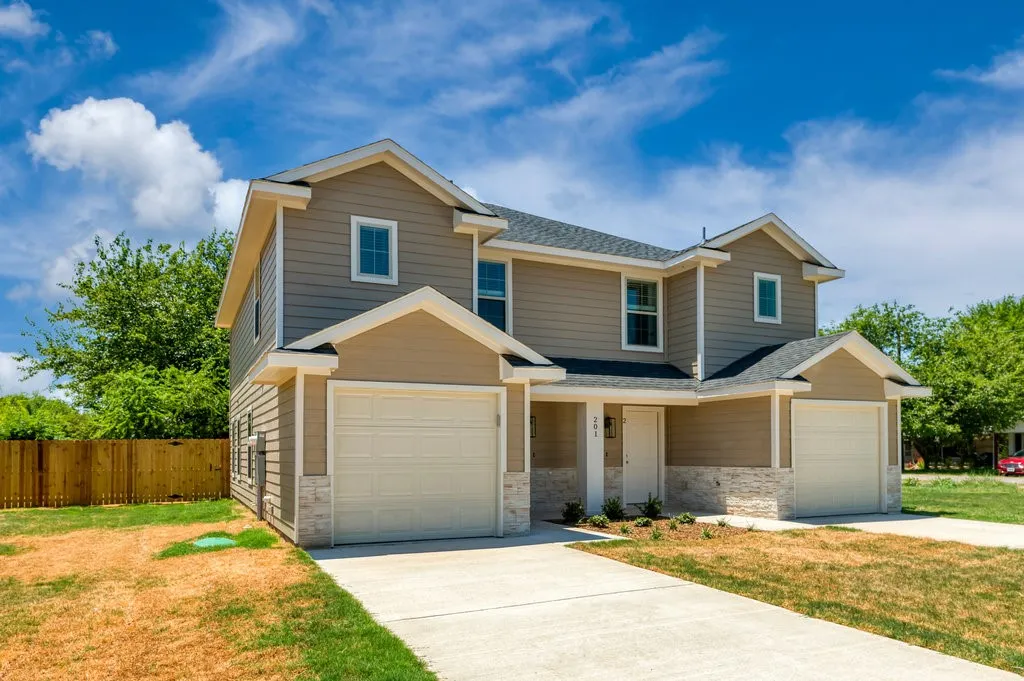 Duplex For Rent in Grayson County , 201 S May Street 1, Whitewright, Texas 75491, 3 Bedroom, 3 Bathroom, 1 Garage spaces, 1,229 Sqft, built in 2022, Price $1,495, mls#21359224, Real Estate Agent in Whitewright, Homes For Rent in Grayson county, Homes For Rent in Whitewright, Realtor in Whitewright Texas, Real Estate Brokerage Independent Realty Texas, Luminita Cordes Realtor