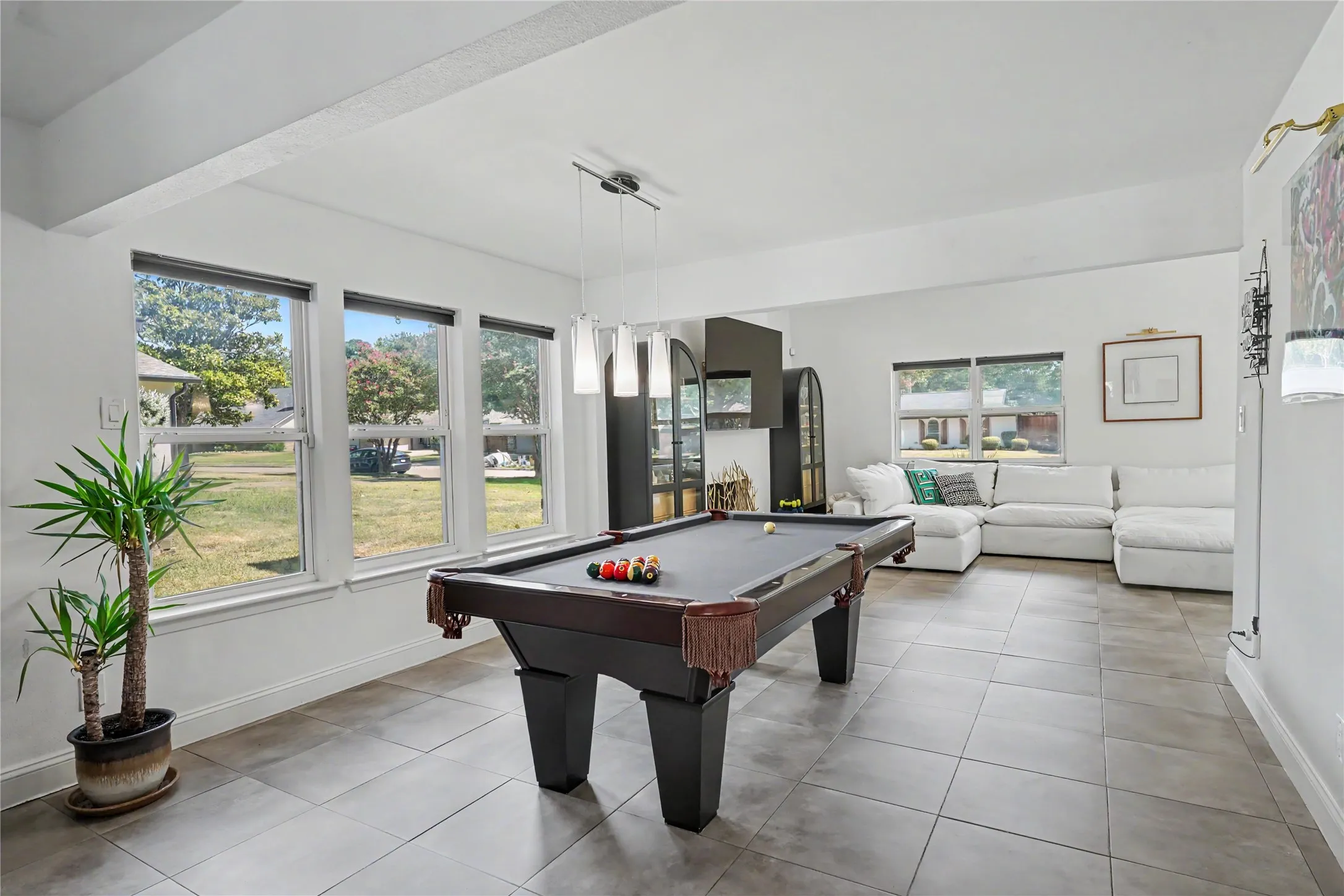 Dining room being used as game room
