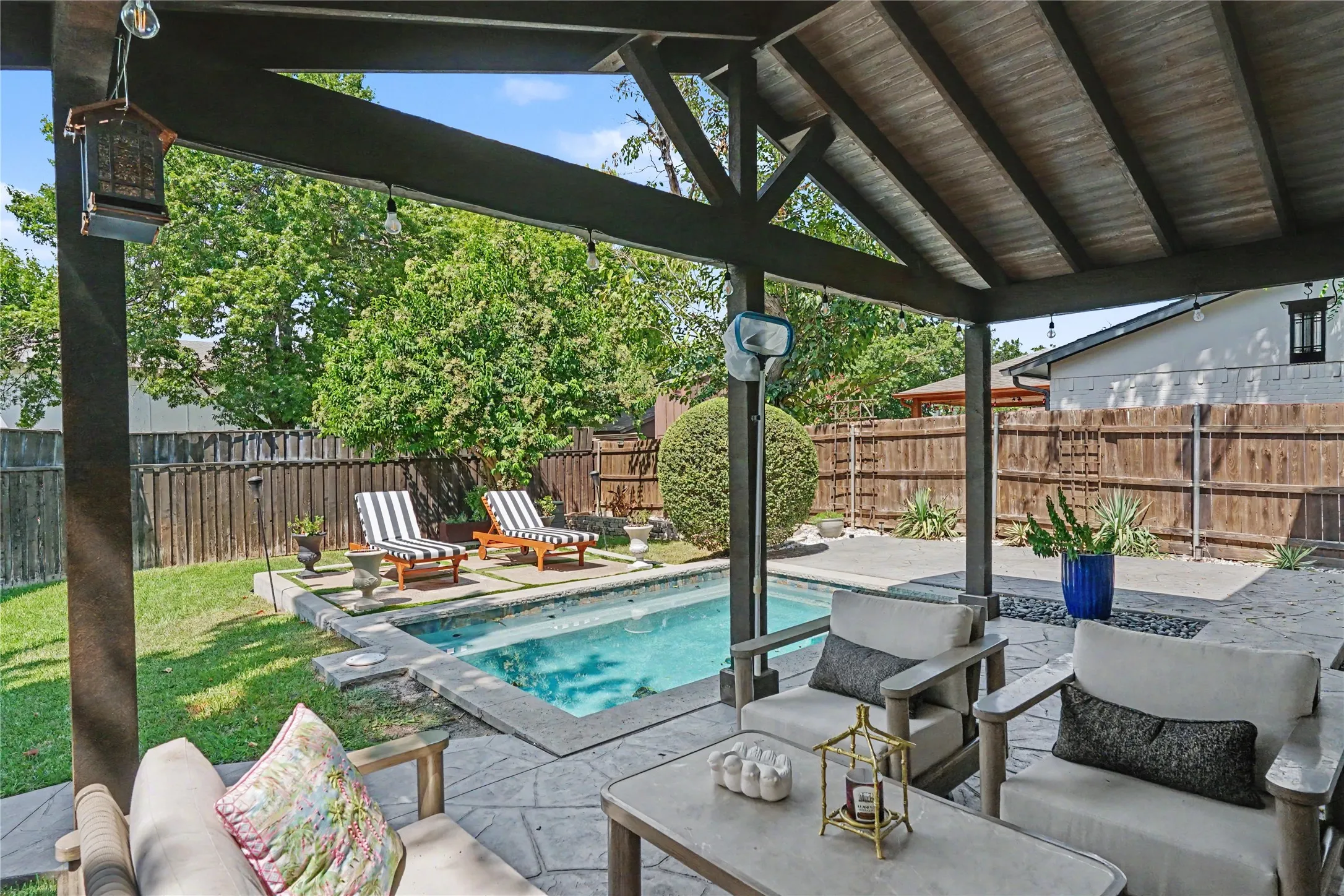 Covered deck looking out to pool