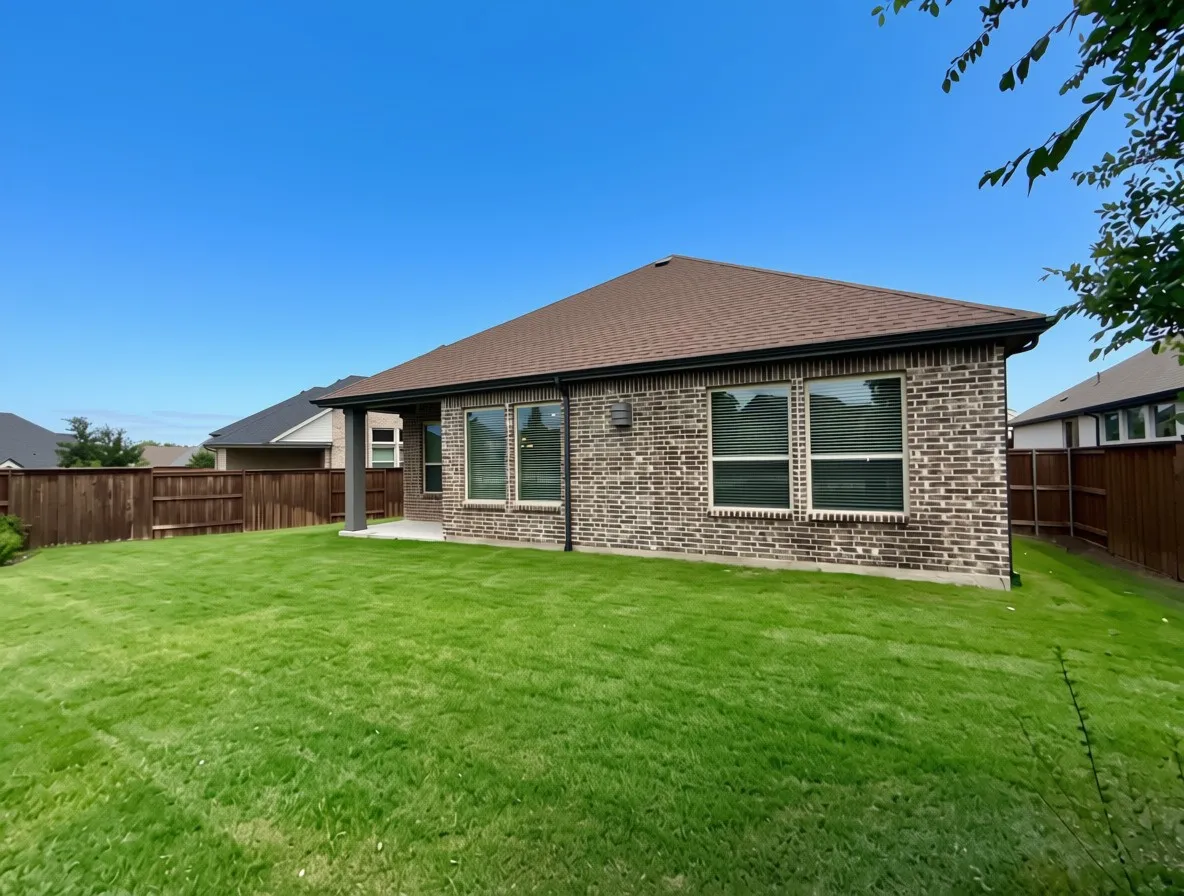 Large backyard with covered patio
