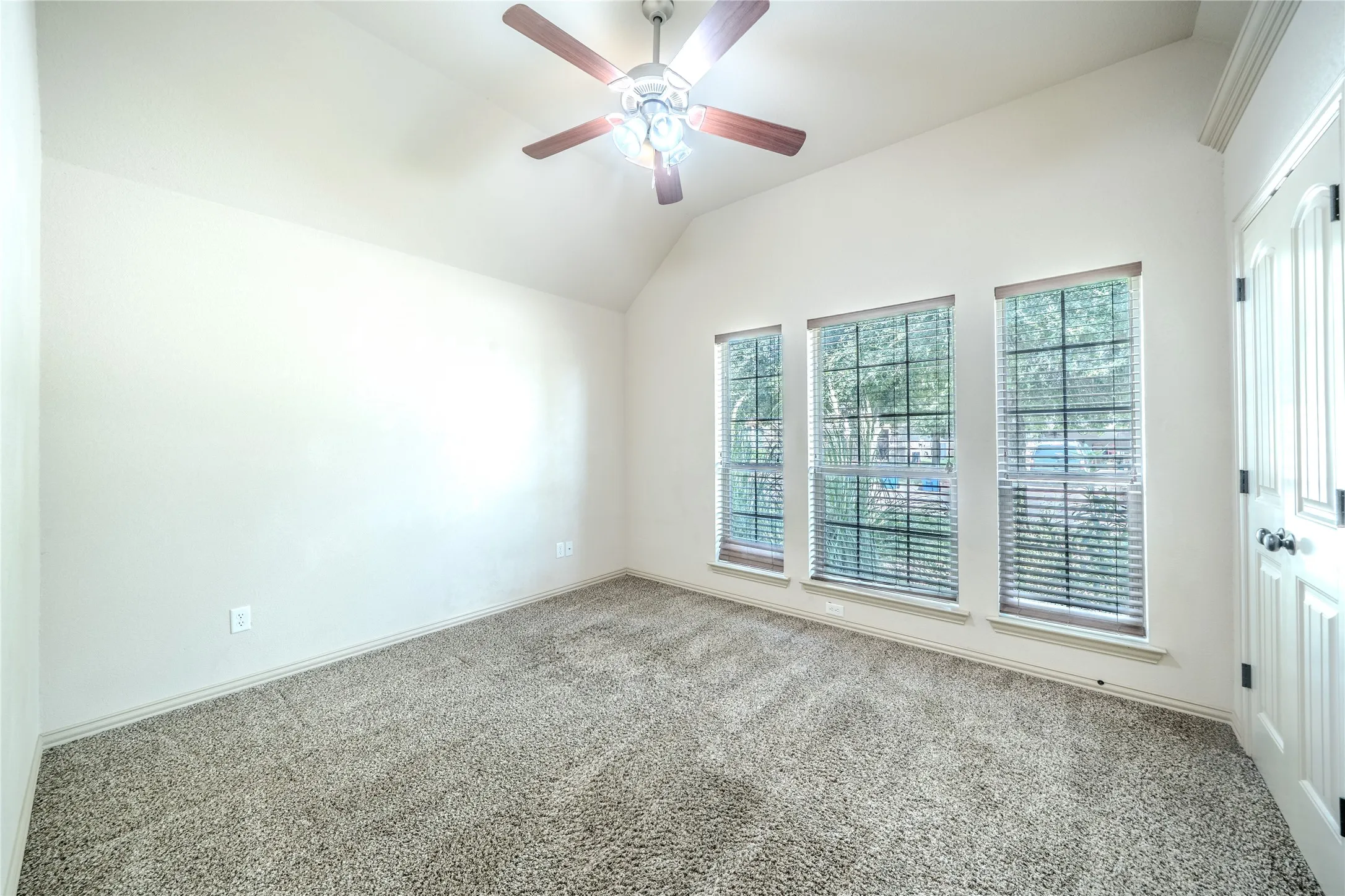 Front bedroom with lots of windows.