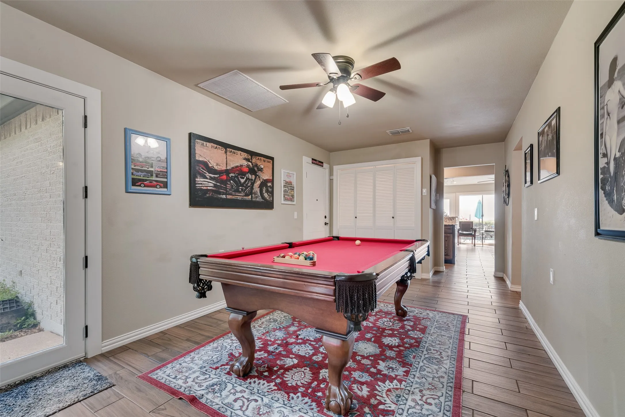 Light-colored walls with wood-finish flooring