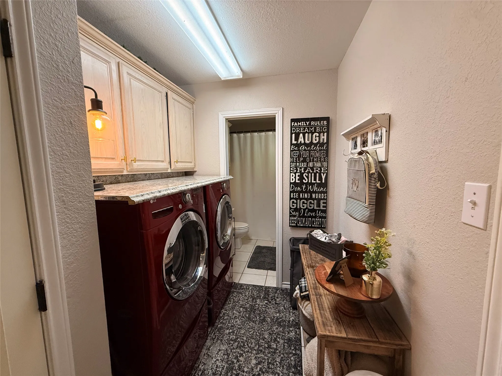 Laundry room with full bath
