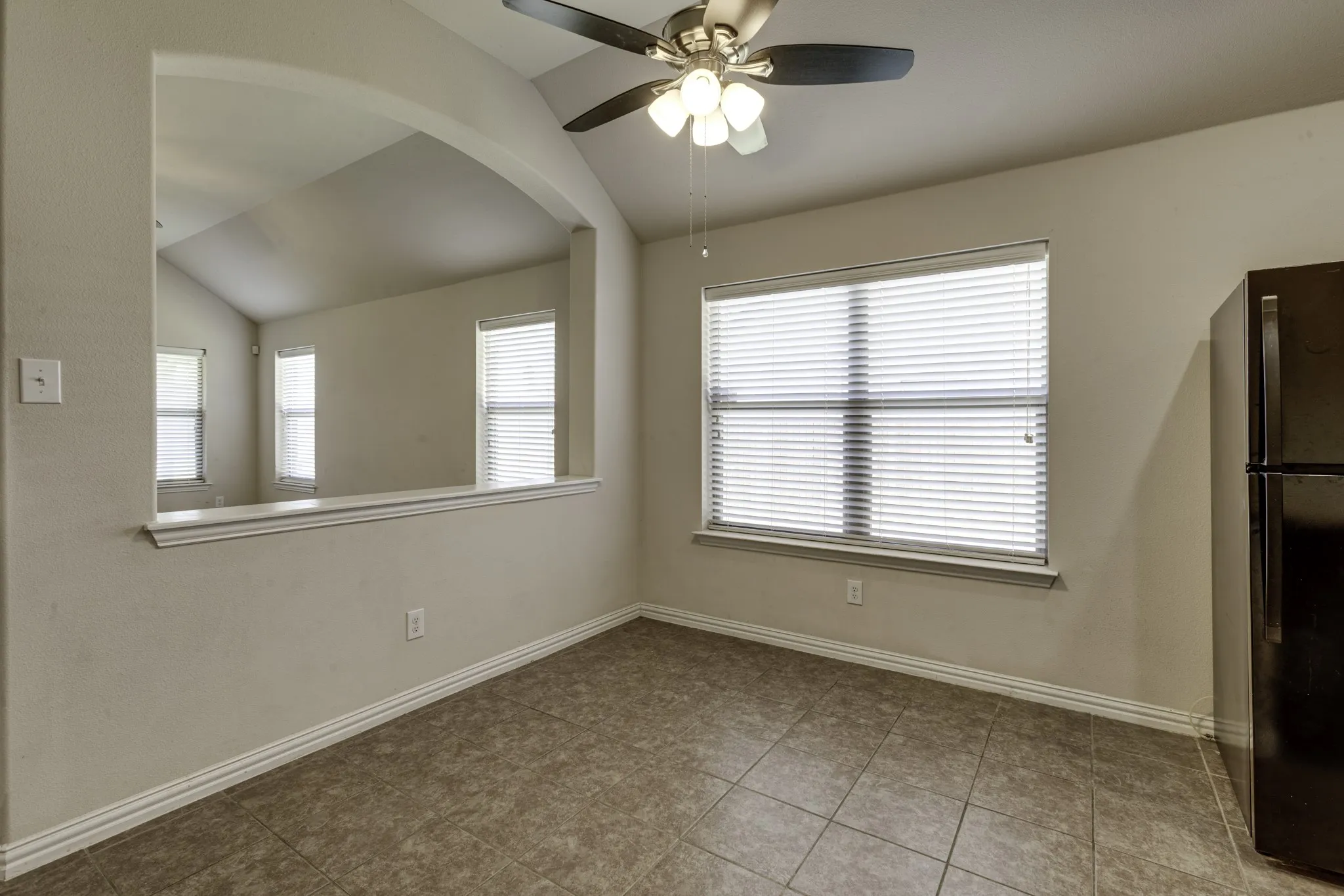 Breakfast area with an opening into the living area.