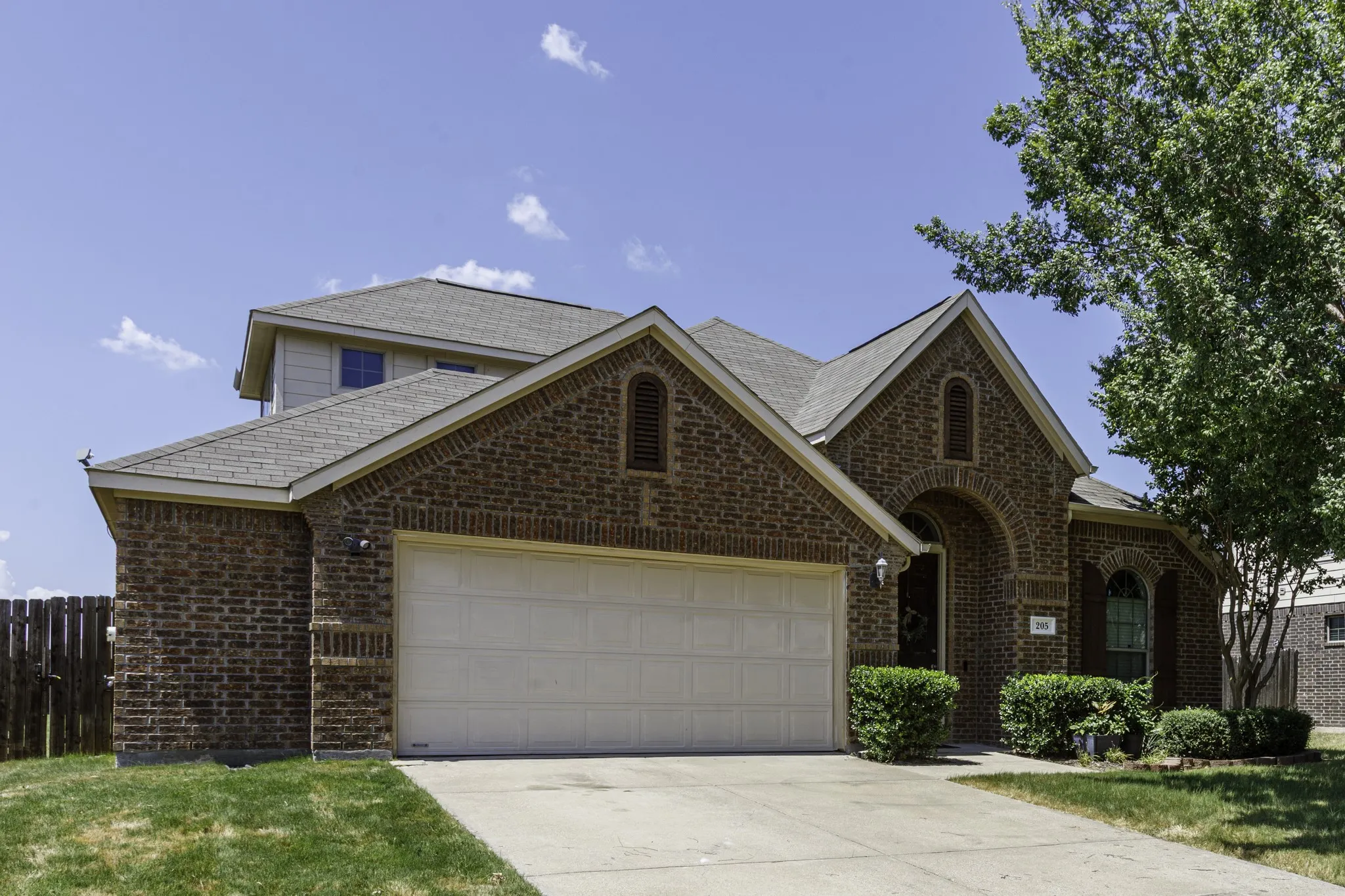 Brick exterior with gabled roof lines