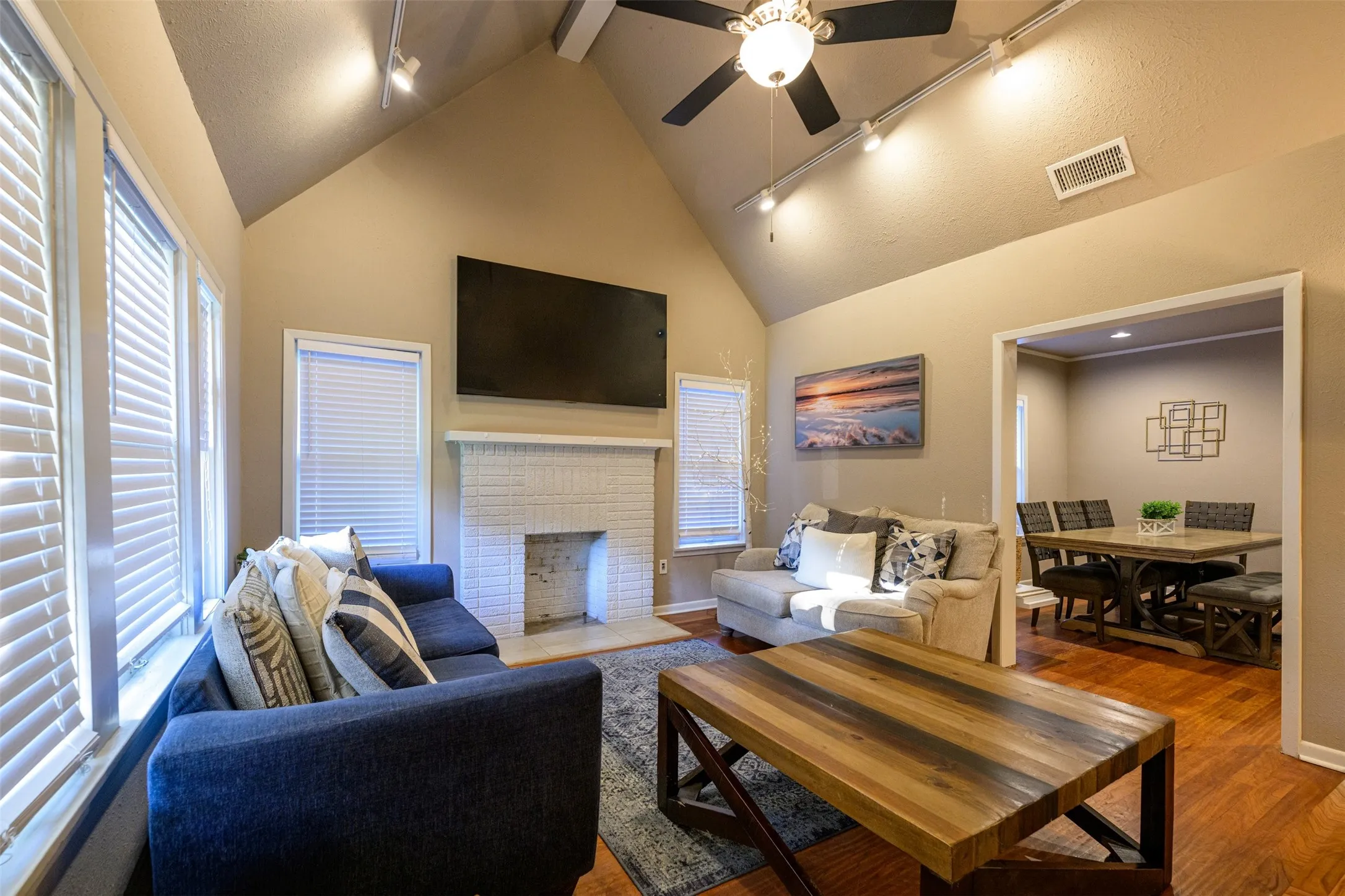 Wood burning fireplace and flat screen TV