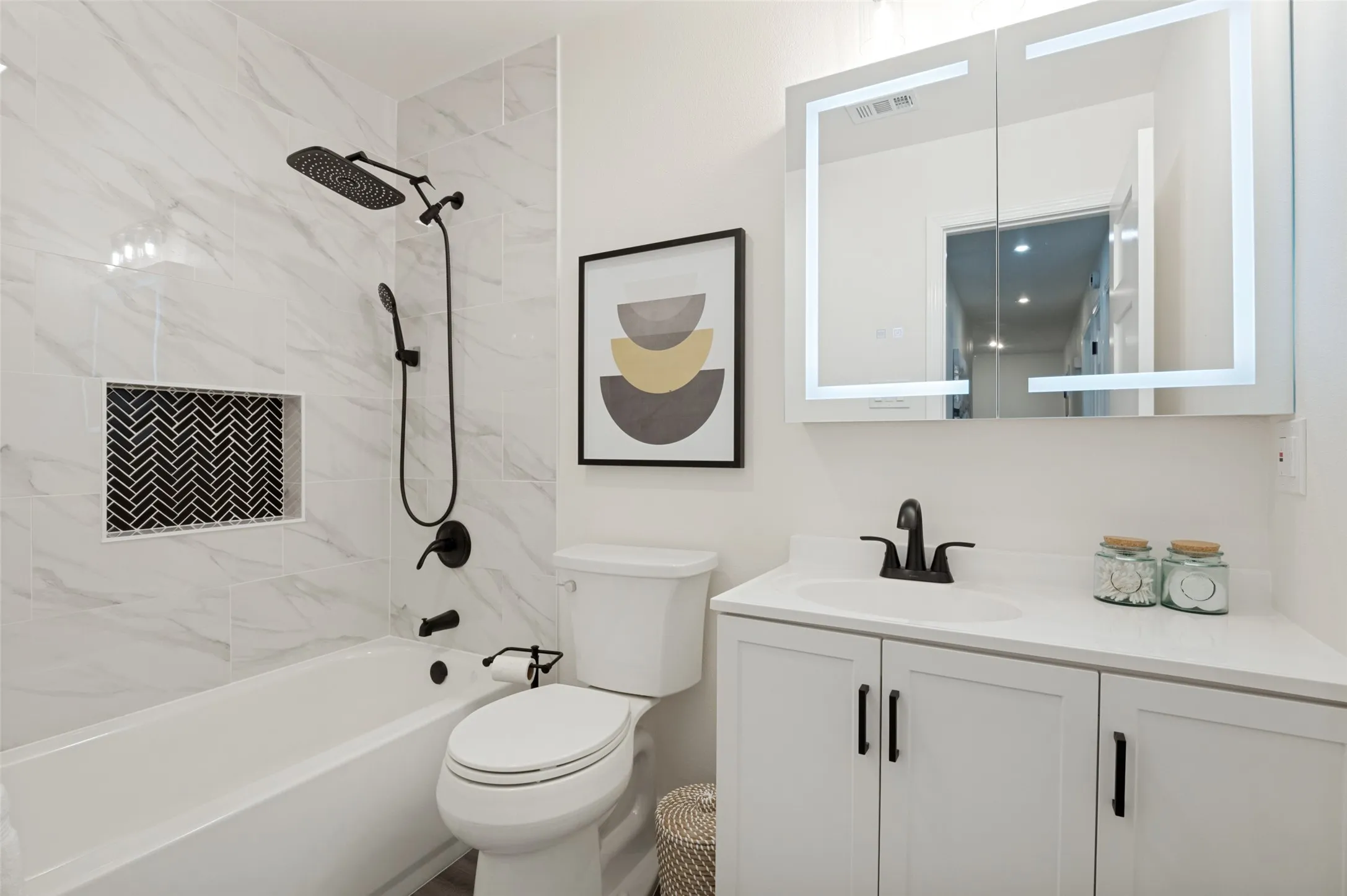 The second full bath also has the defogger and light on the mirror that is also a medicine cabinet!