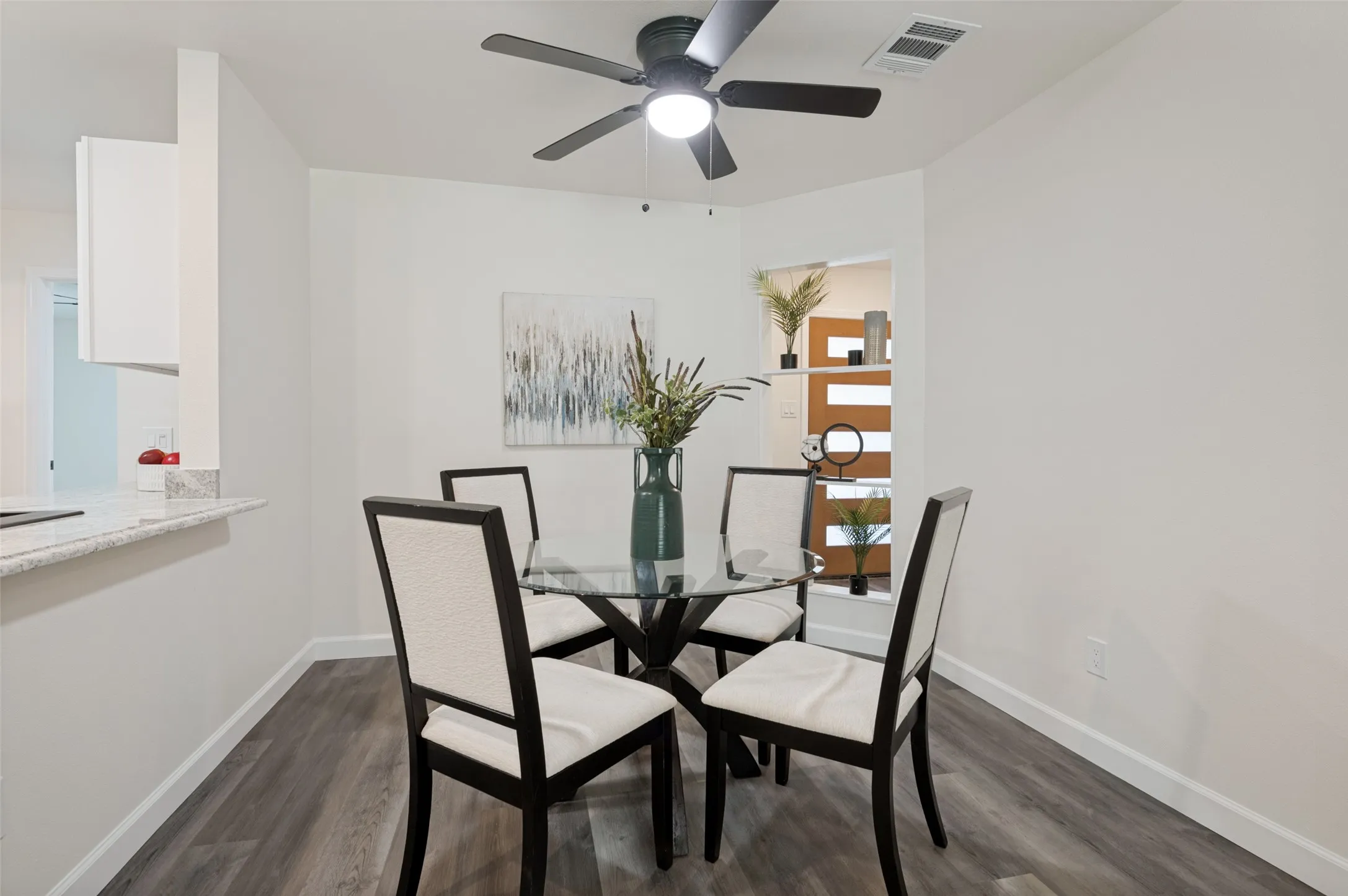 This is staged with the round table - sill plenty of space for your rectangular dining table that seats 6 or 8!