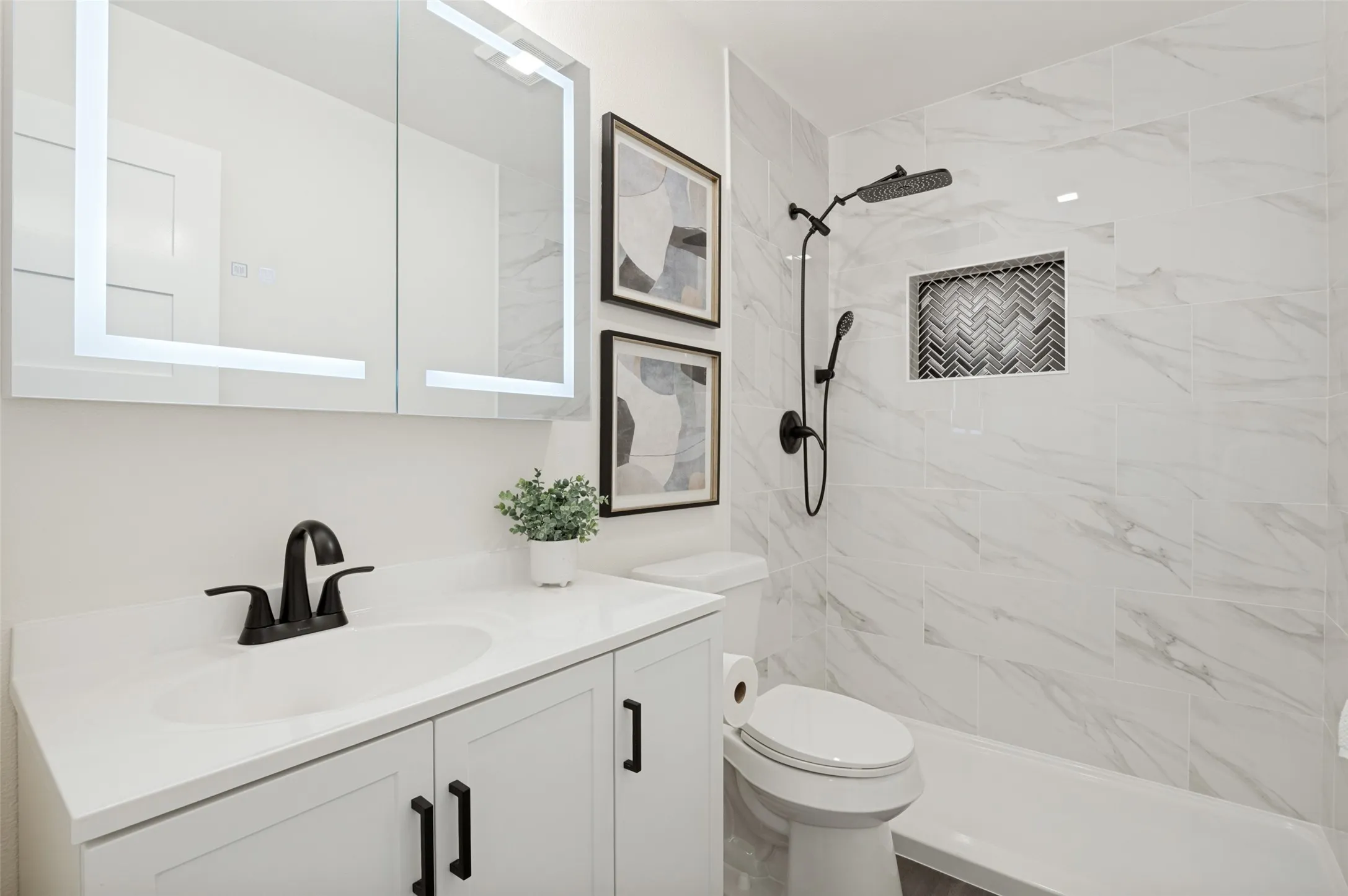 Step into your own ensuite bathroom with the defogger and light on the mirror that is also a medicine cabinet!
