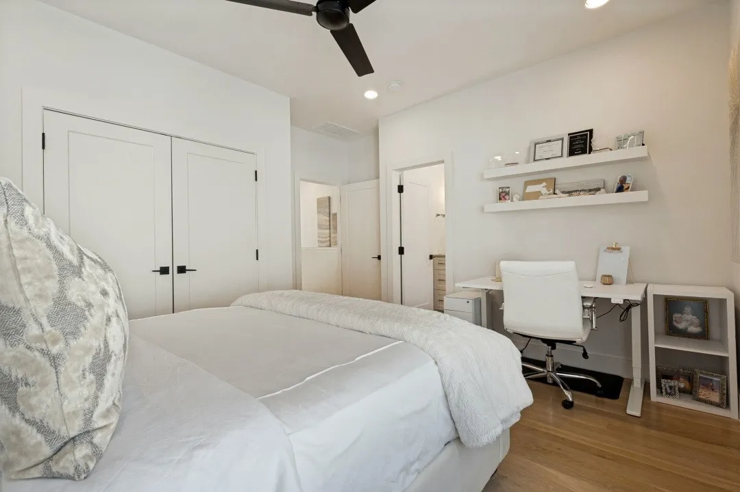 Light wood-finish flooring, recessed lighting, and a ceiling fan
