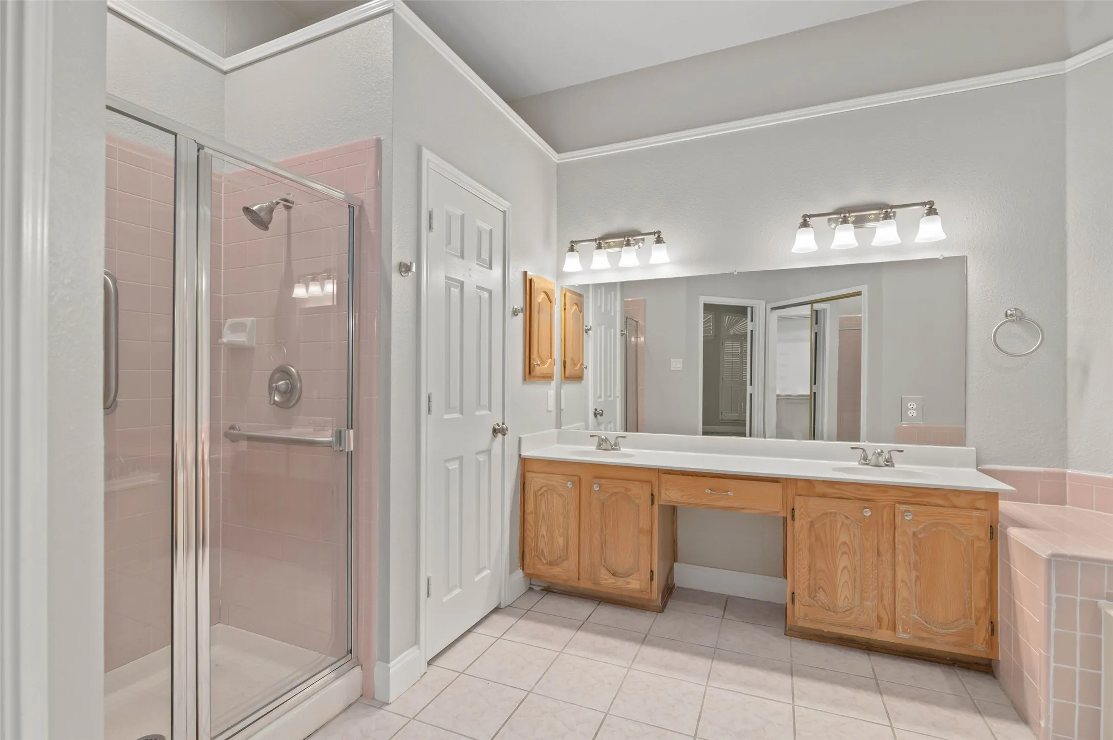 Primary bathroom with separate shower and garden tub.