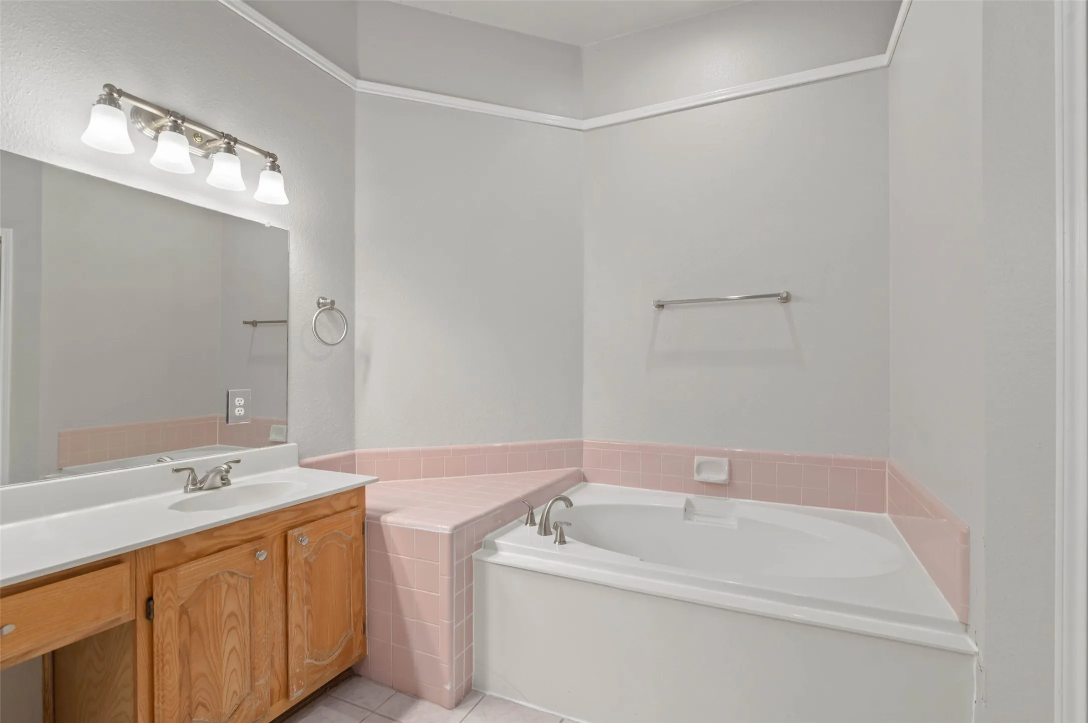 Primary bathroom with separate shower and garden tub.