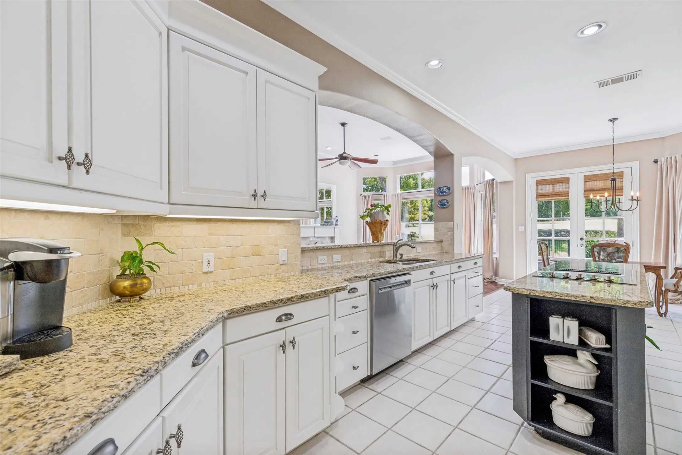 Kitchen with granite counters.