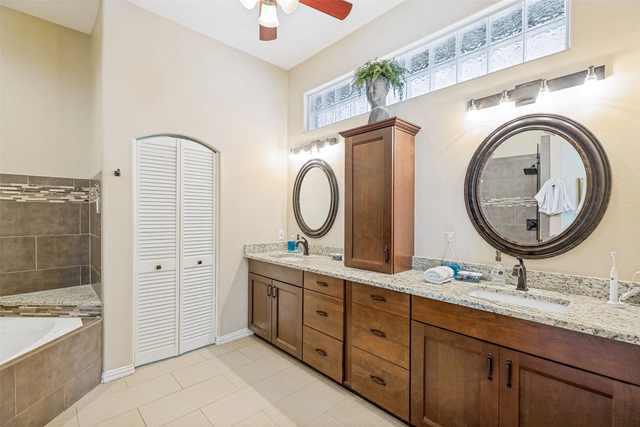 Dual sinks and custom wood cabinets.