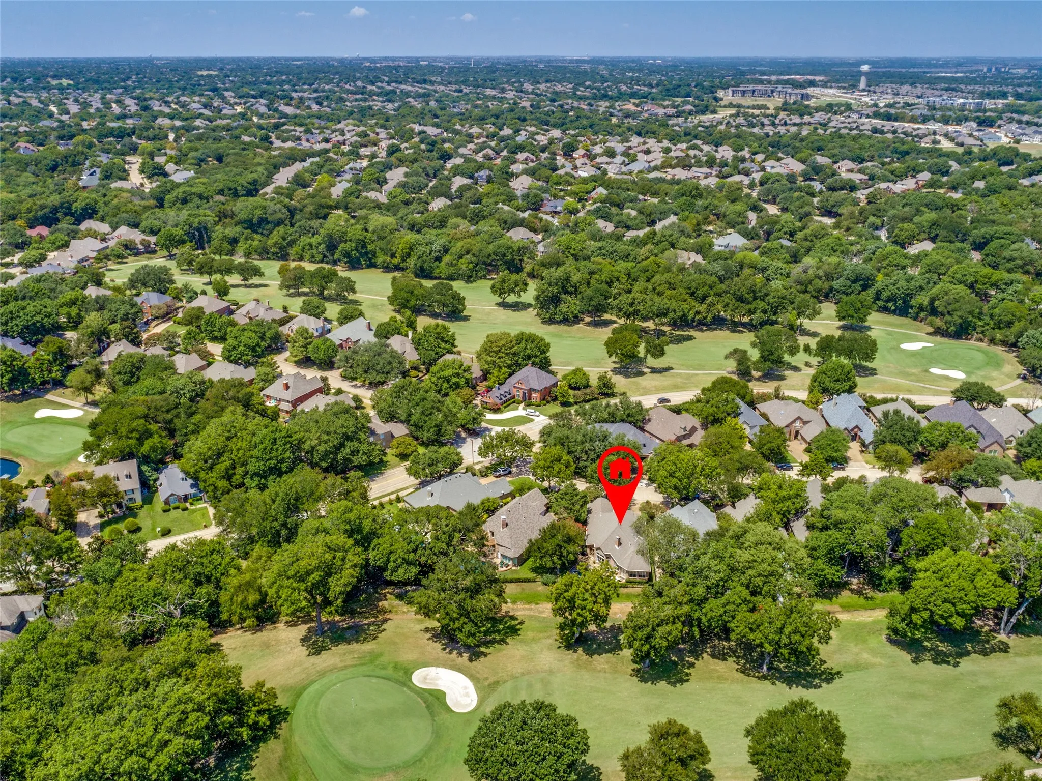 The home overlooks #17 green at Eldorado Country Club.