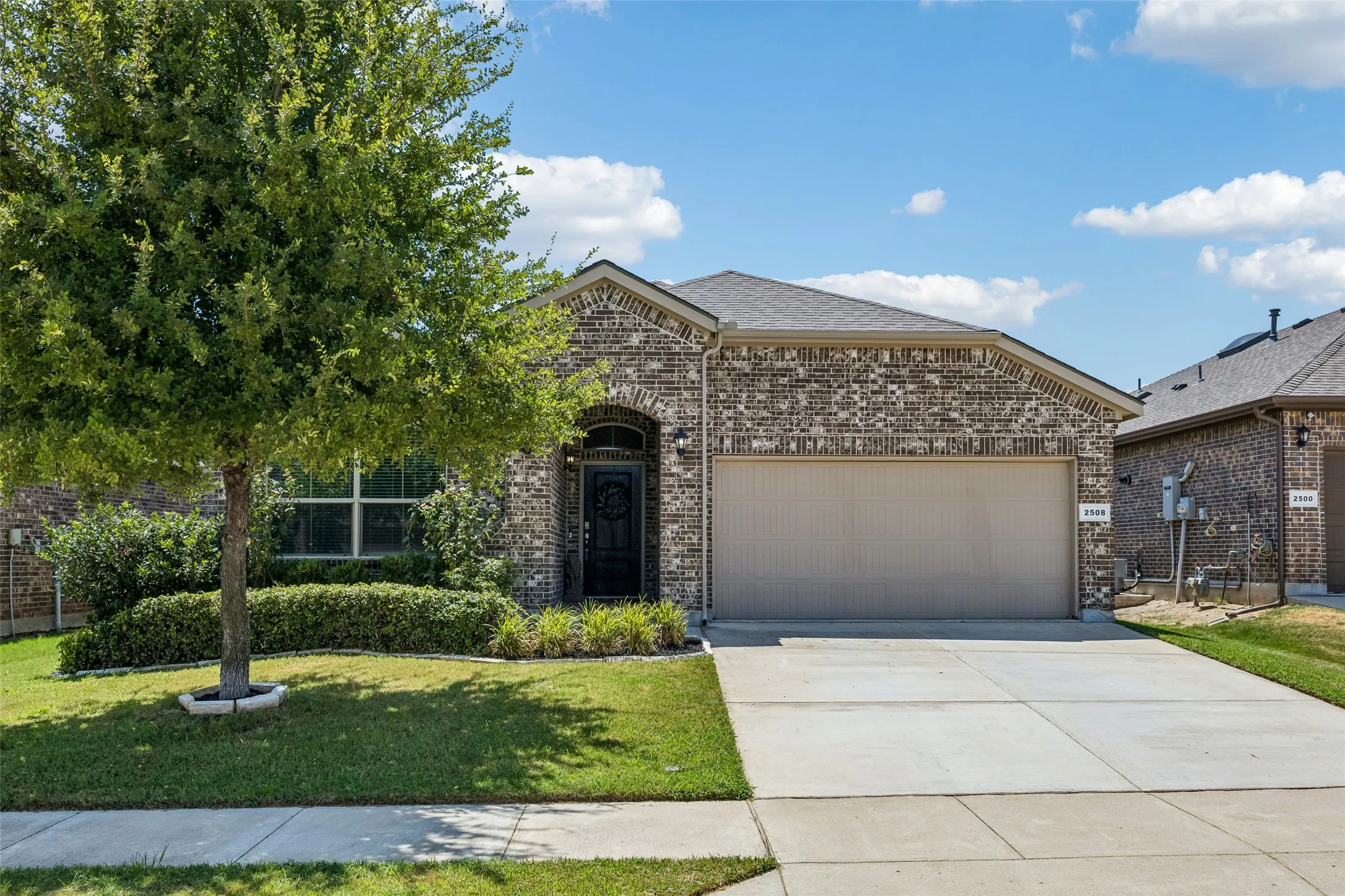 Brick exterior with an arched entryway