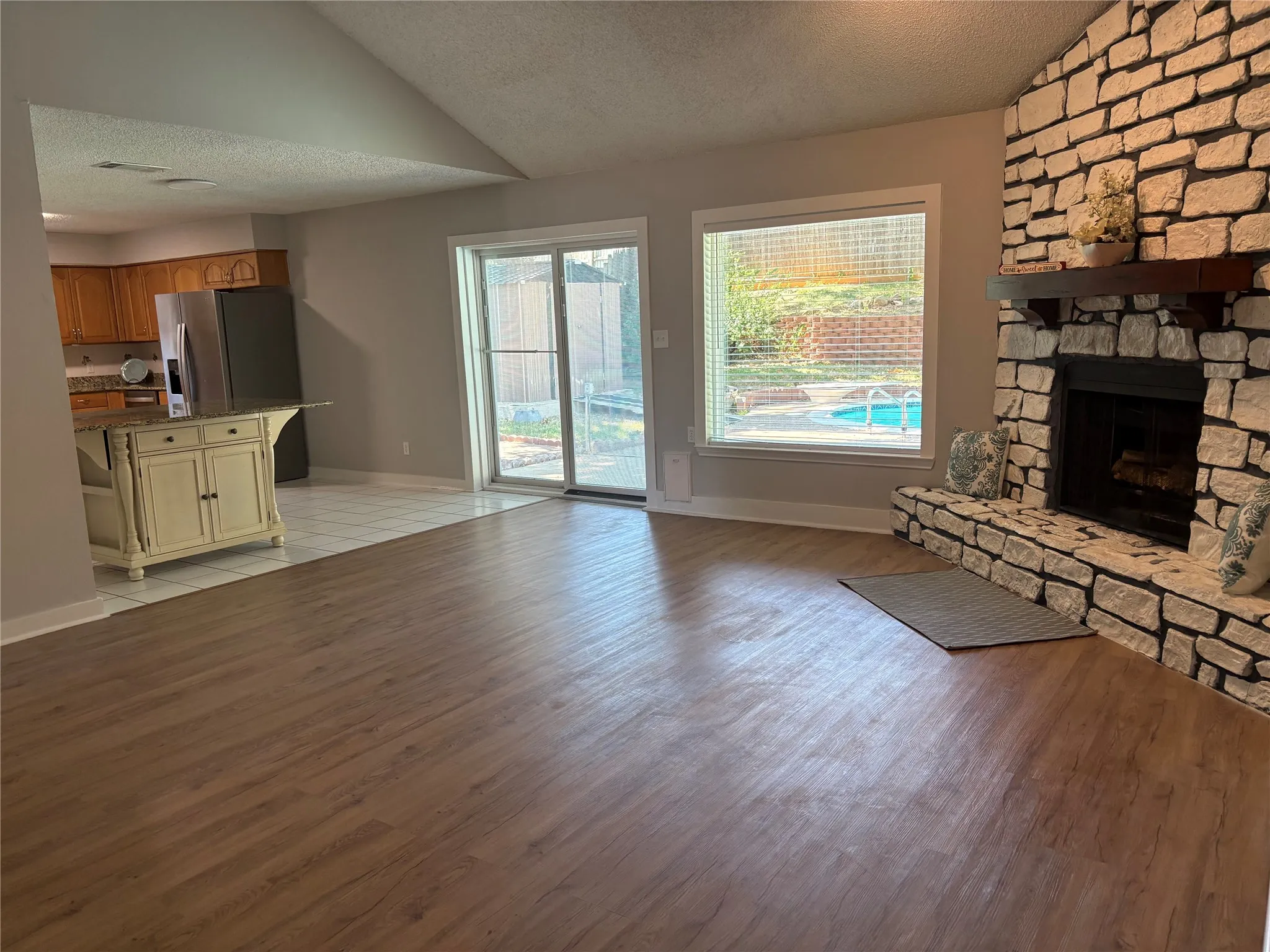 Alternate view of kitchen from living room.