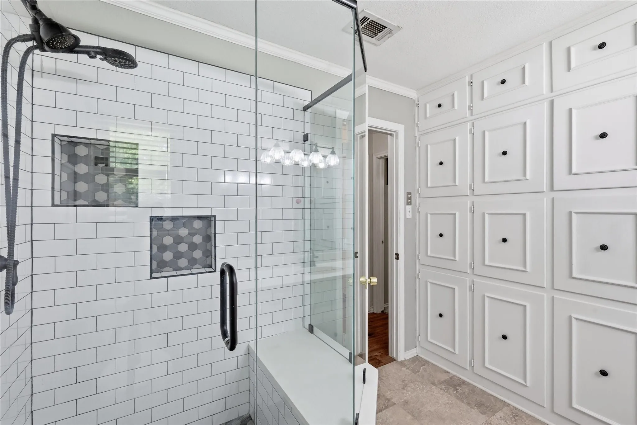 Very large bathroom with floor to ceiling cabinets!