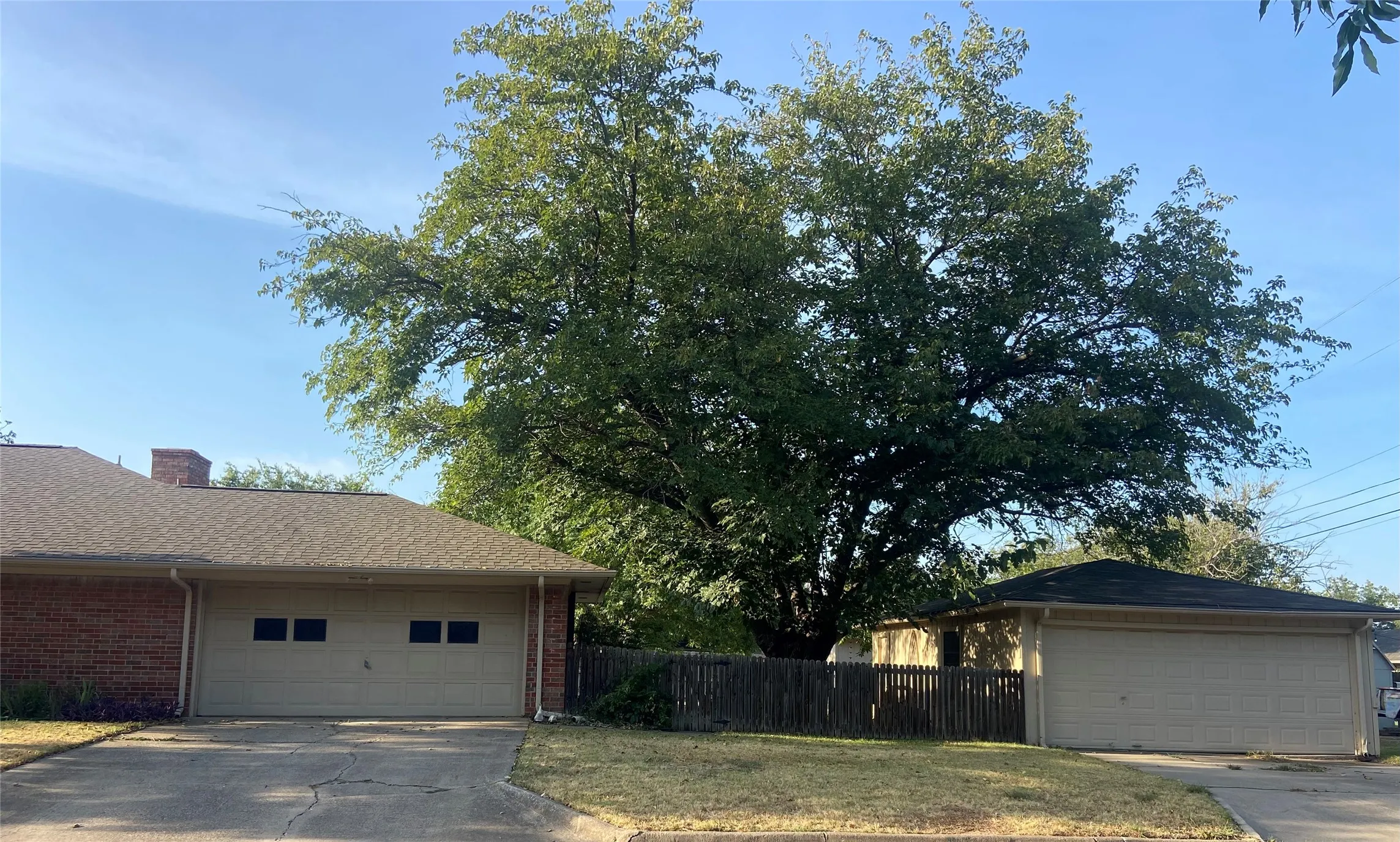 Two 2-car garages - one attached and one detached with storage area.