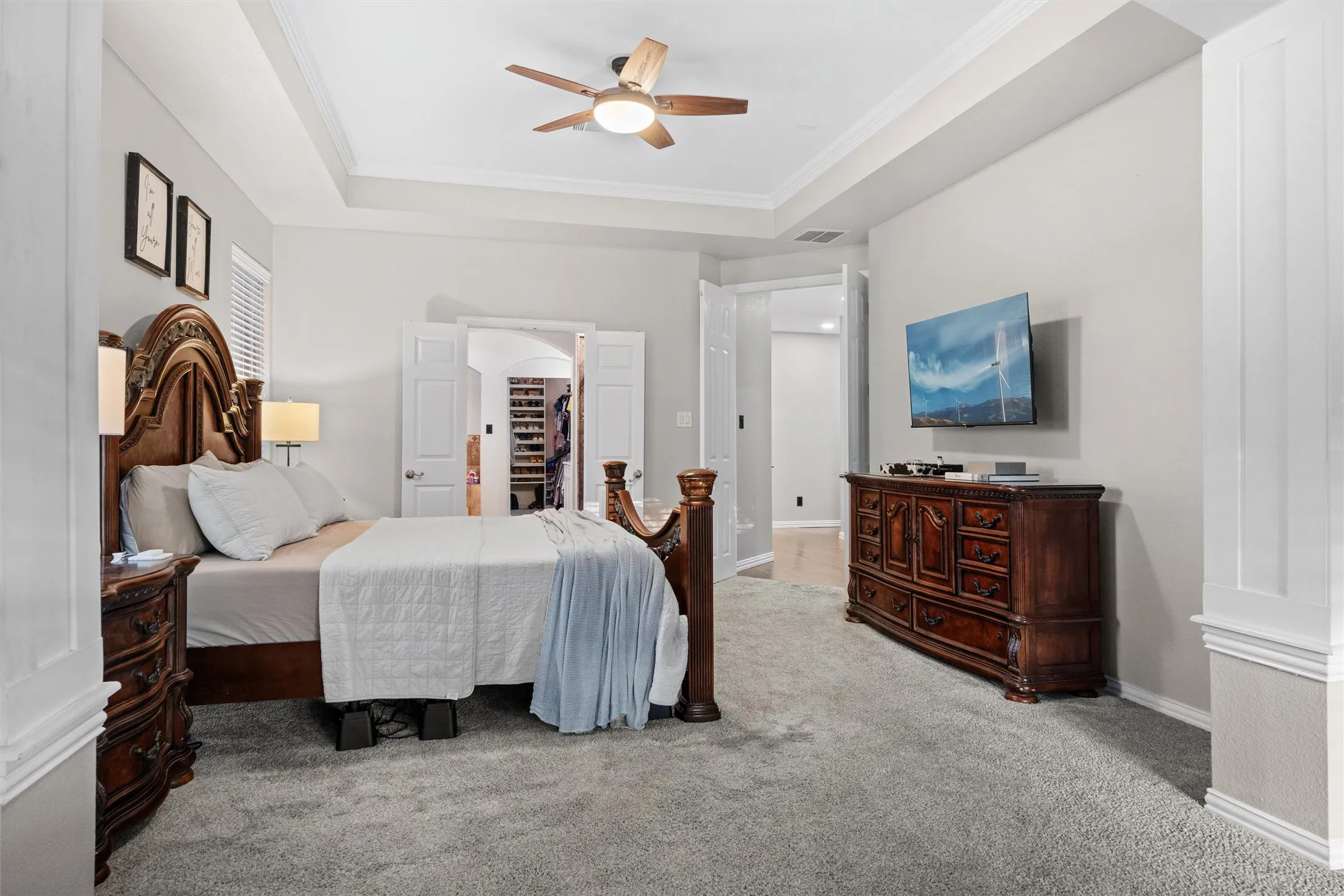 Primary bedroom and en suite bath with spacious walk in closet.