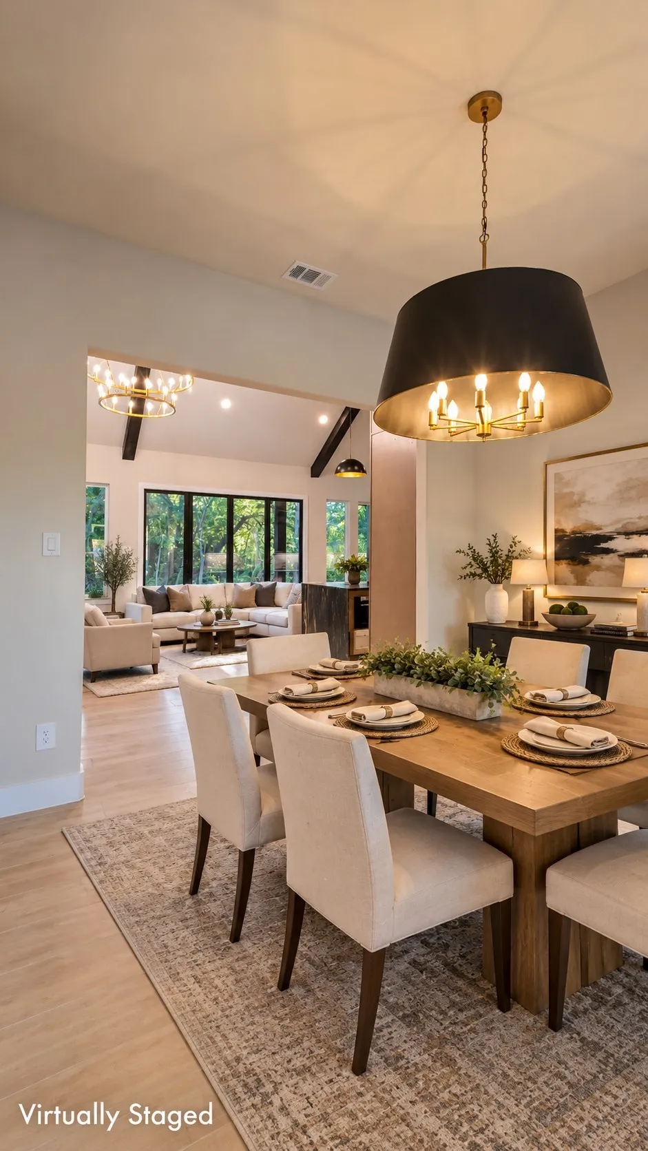 Recessed lighting, wood-finish flooring, and a decorative light fixture with a drum shade