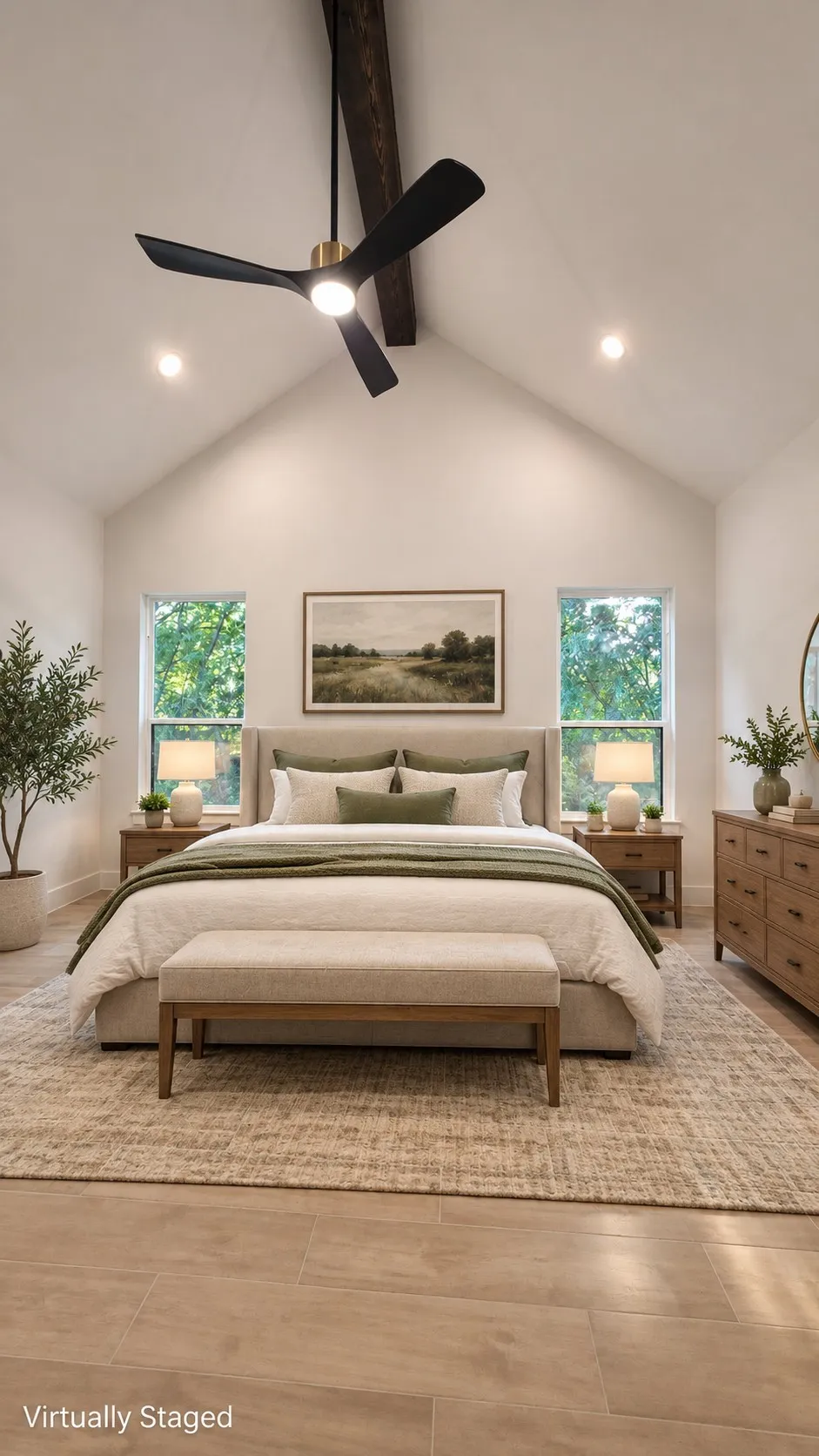 Vaulted ceiling with exposed wood beam, recessed lighting, and a modern ceiling fan