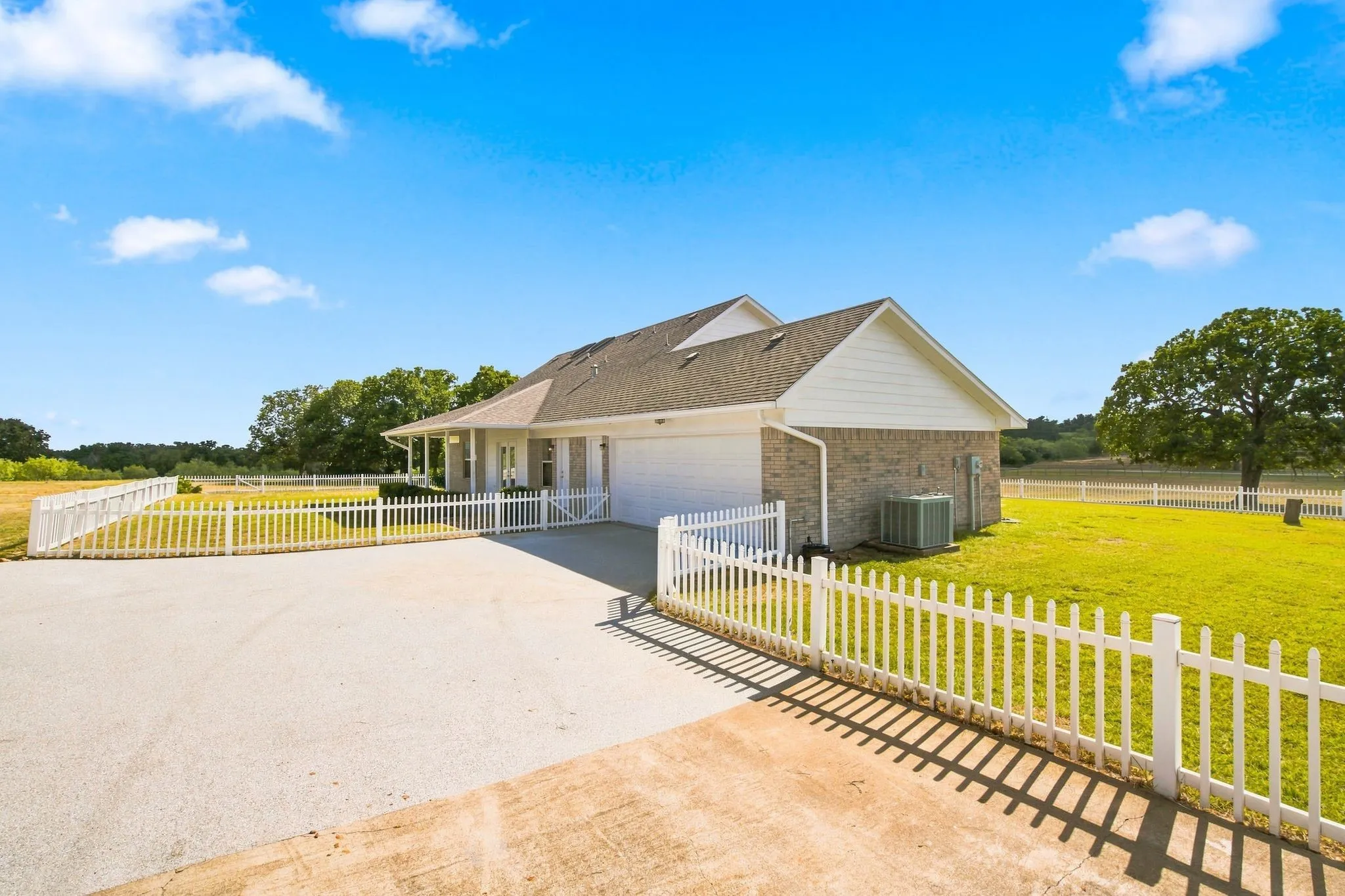 New epoxy coating on driveway parking area and porch "It's Gorgeous"