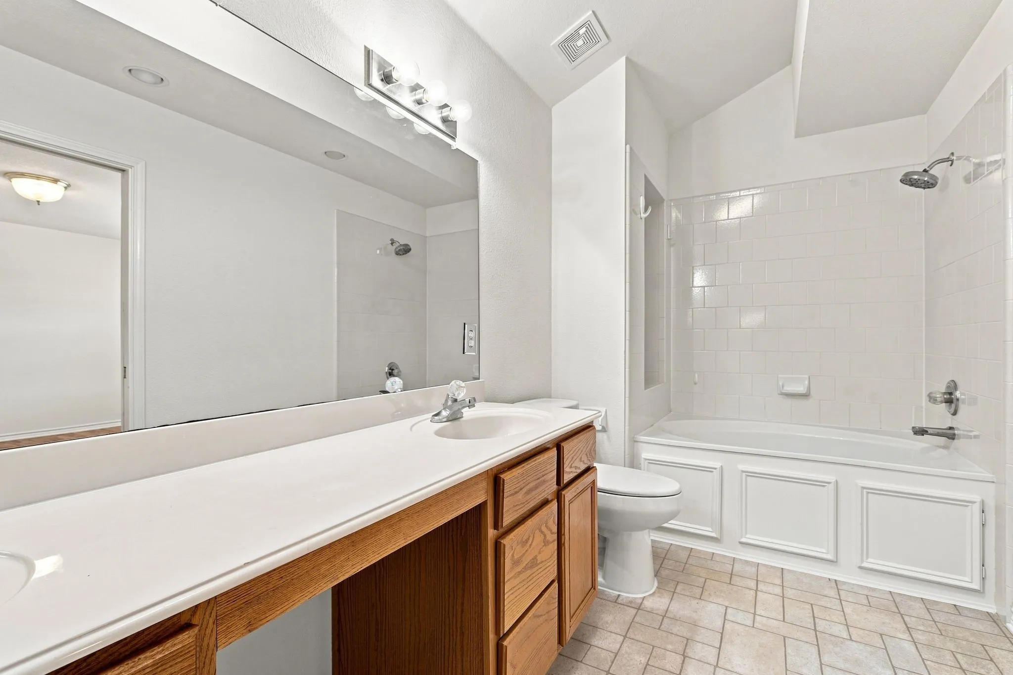 Primary bathroom with a large deep garden tub