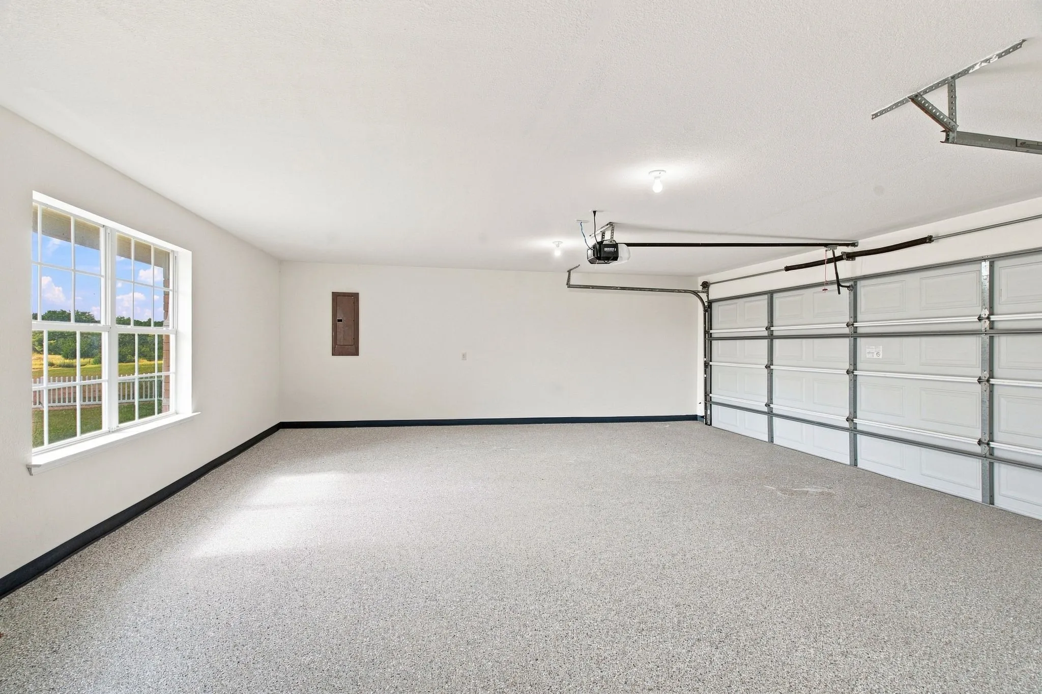 Oversized garage with new epoxy floors