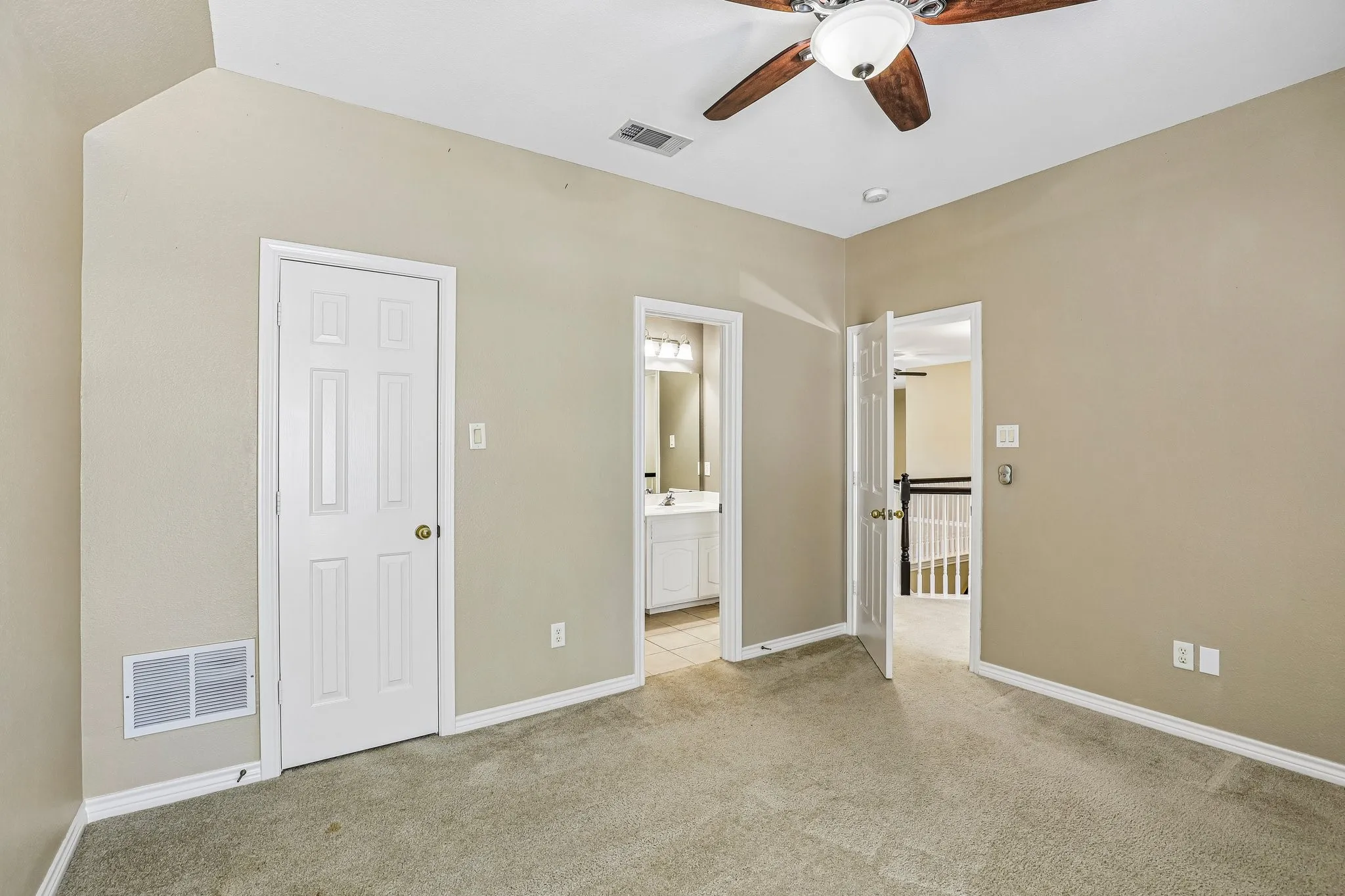 Upstairs bedroom with walk-in closet.