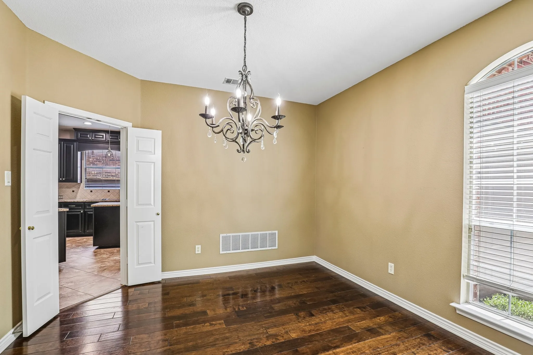 Dining room with French door entry.